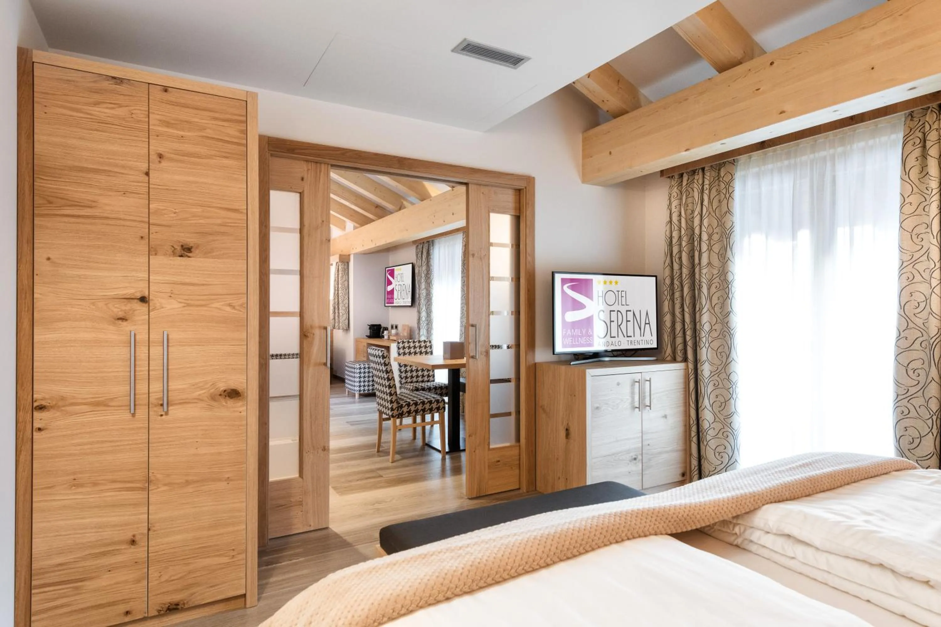 Bed in Family Hotel Serena