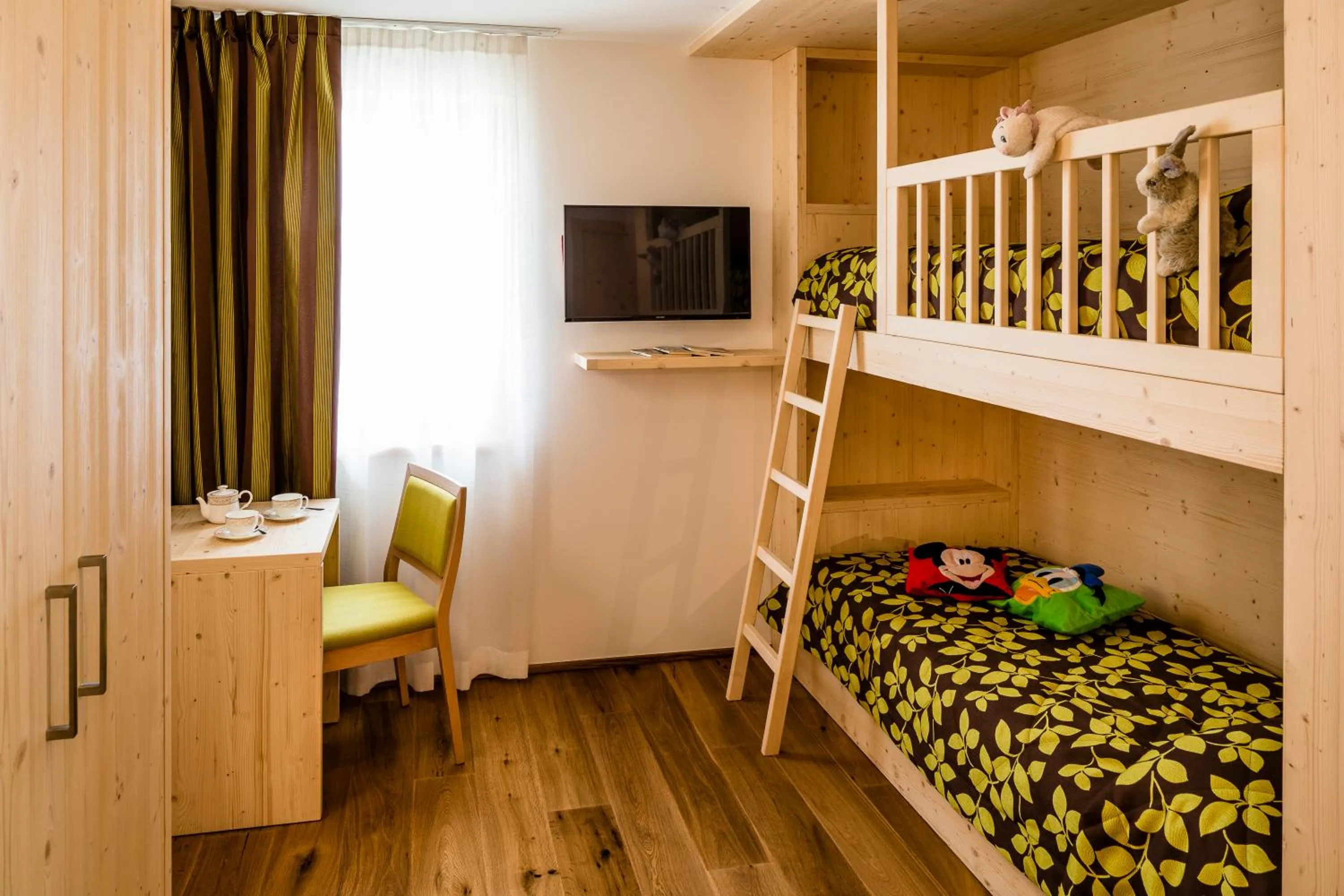 Bed in Family Hotel Serena