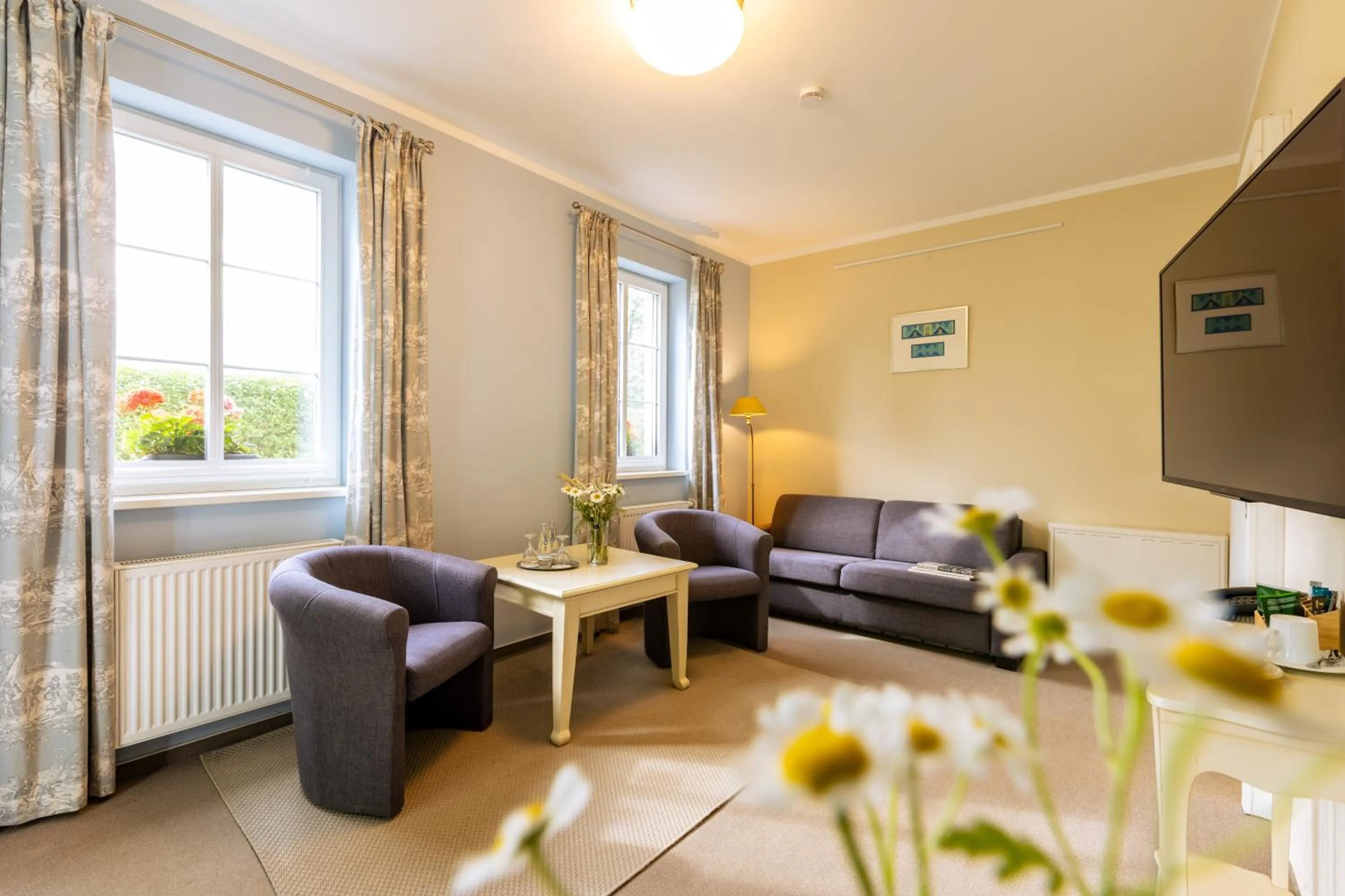 TV and multimedia in Café Wildau Hotel & Restaurant am Werbellinsee