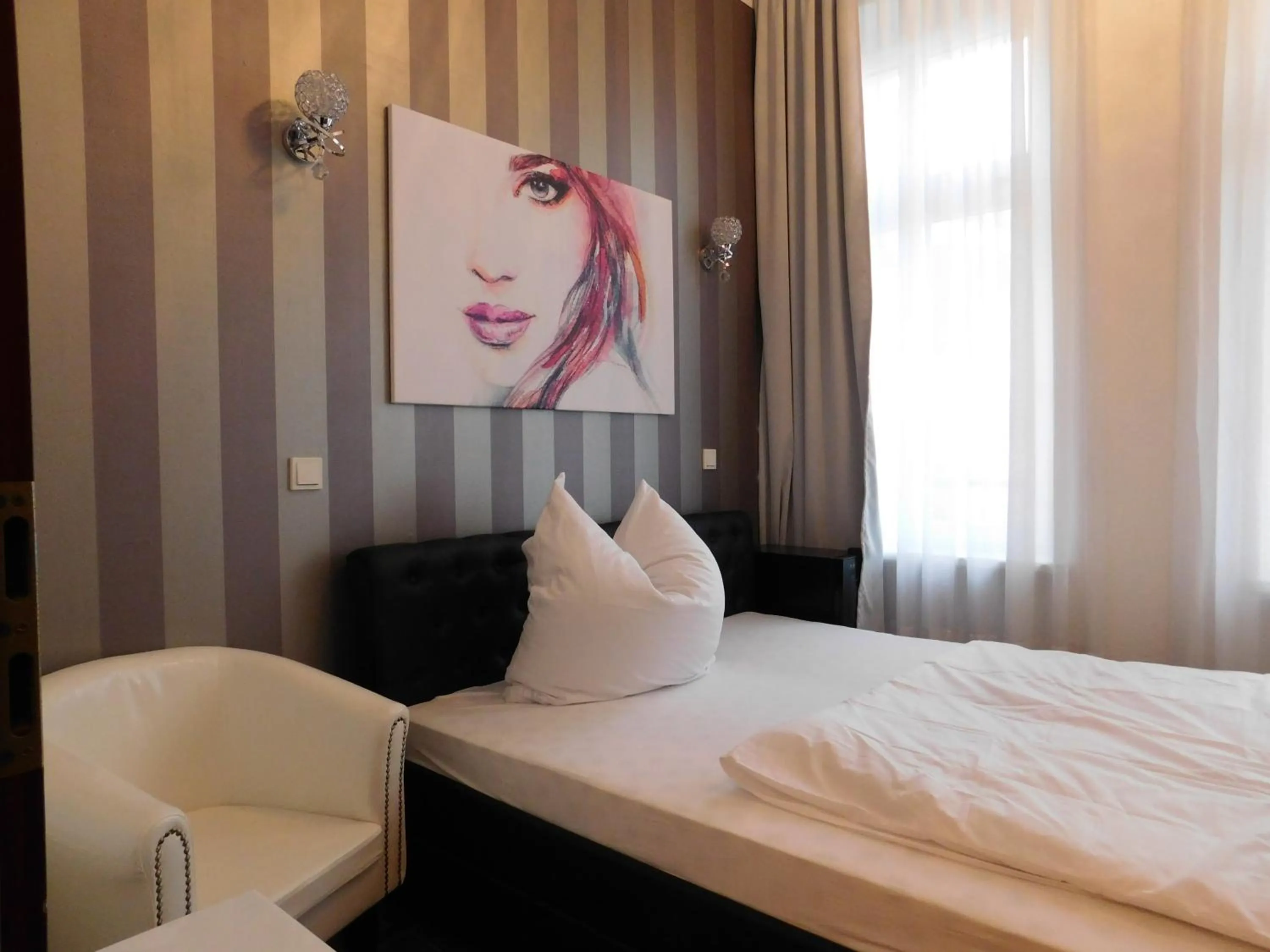 Bed in Hotel Maison LeMi