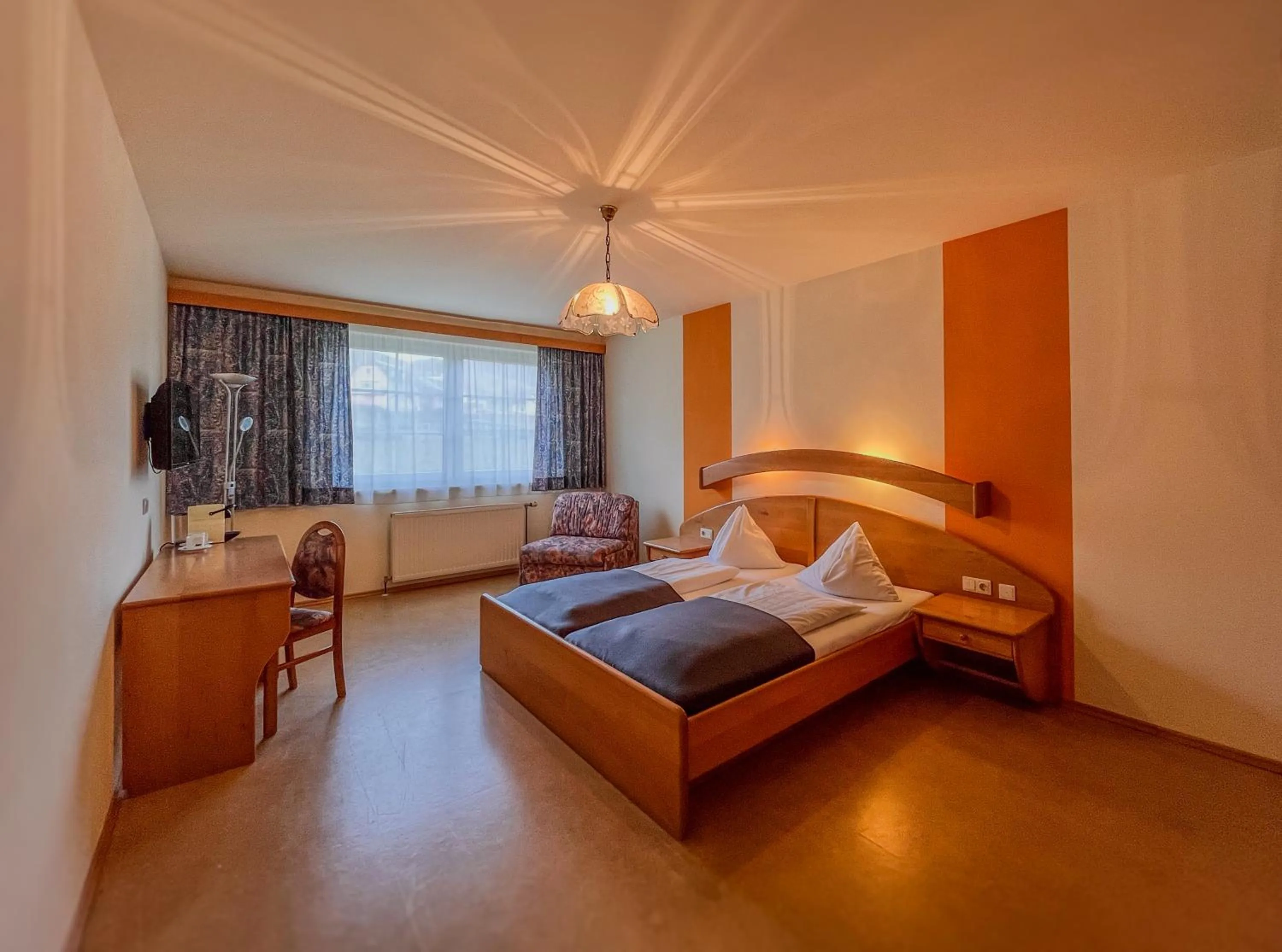 Bed in STIERSCHNEIDER'S Weinhotel Wachau & Wiazhaus