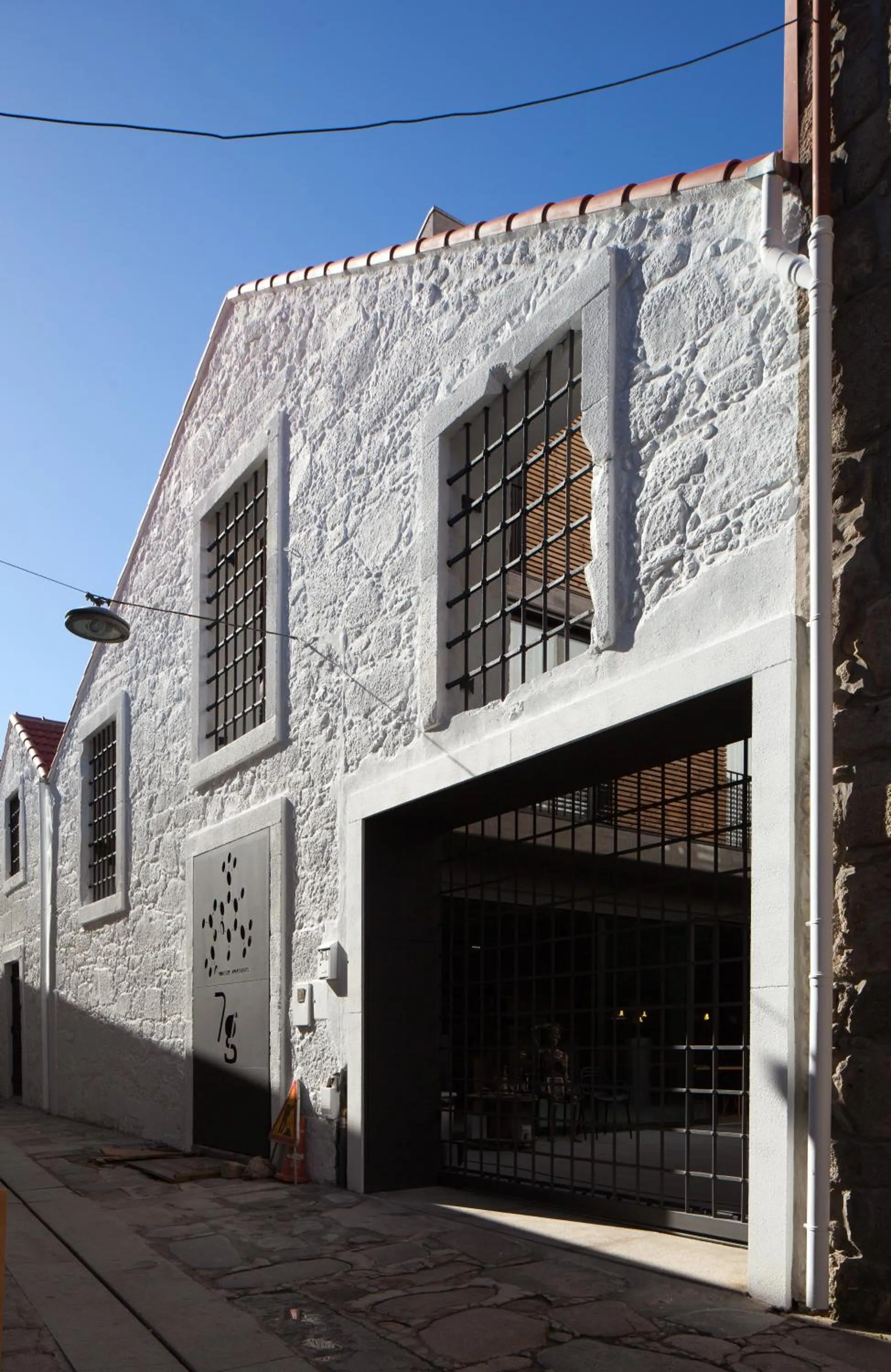 Property logo or sign in 7 Gaia Roaster Apartments