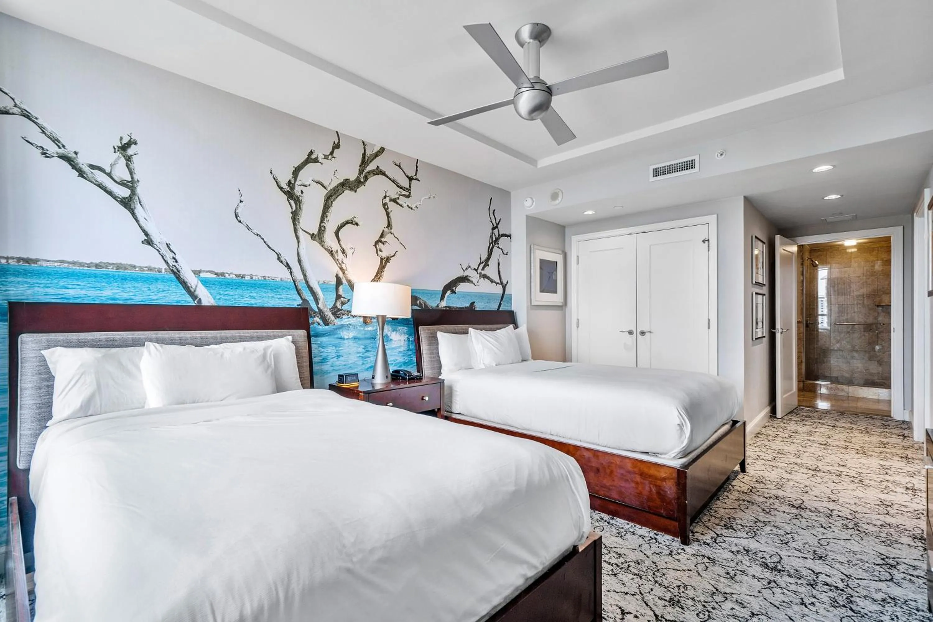 Bed in Palm Beach Singer Island Resort & Spa Luxury Suites