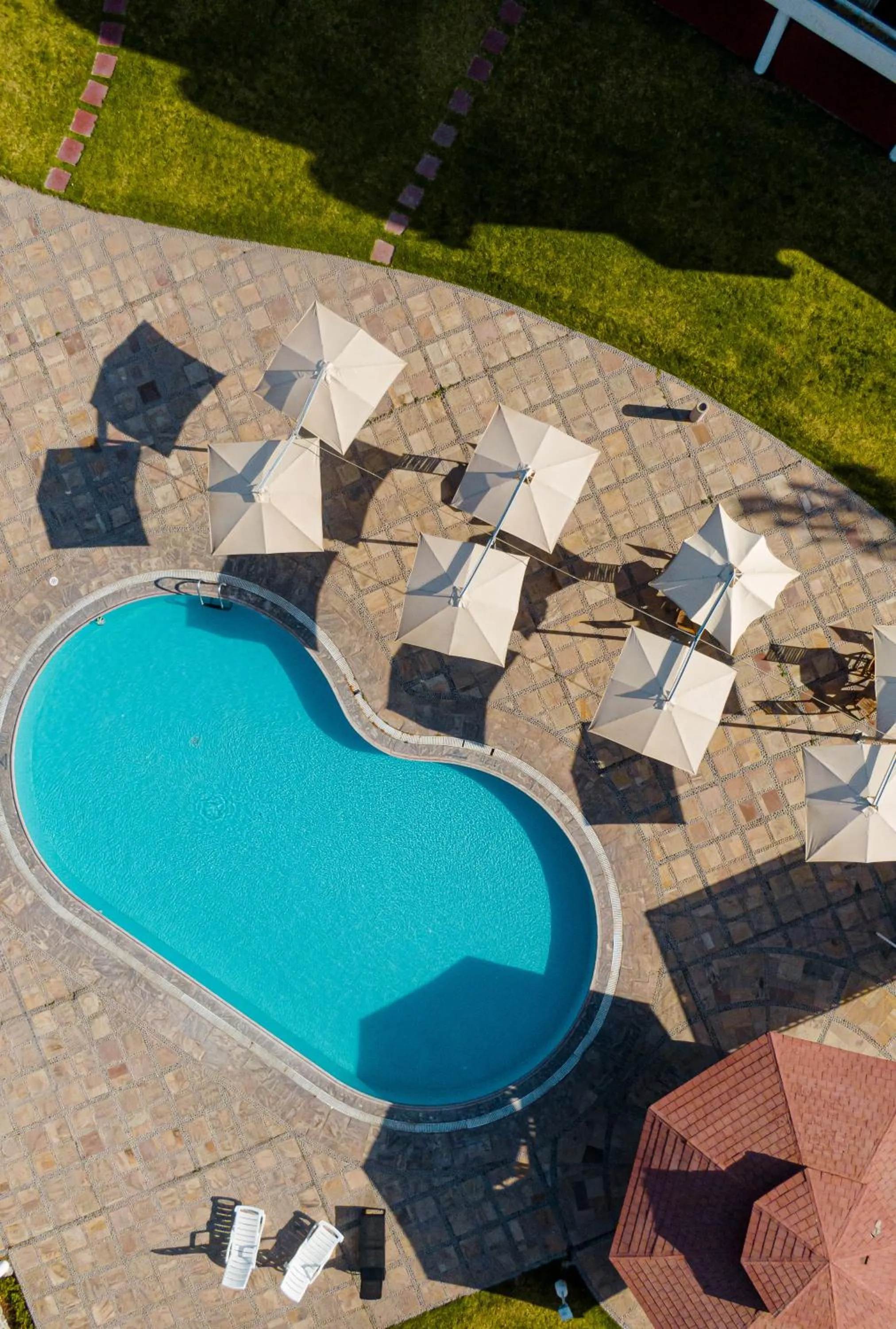 Swimming pool in El LAGO HOTEL by Luoxo