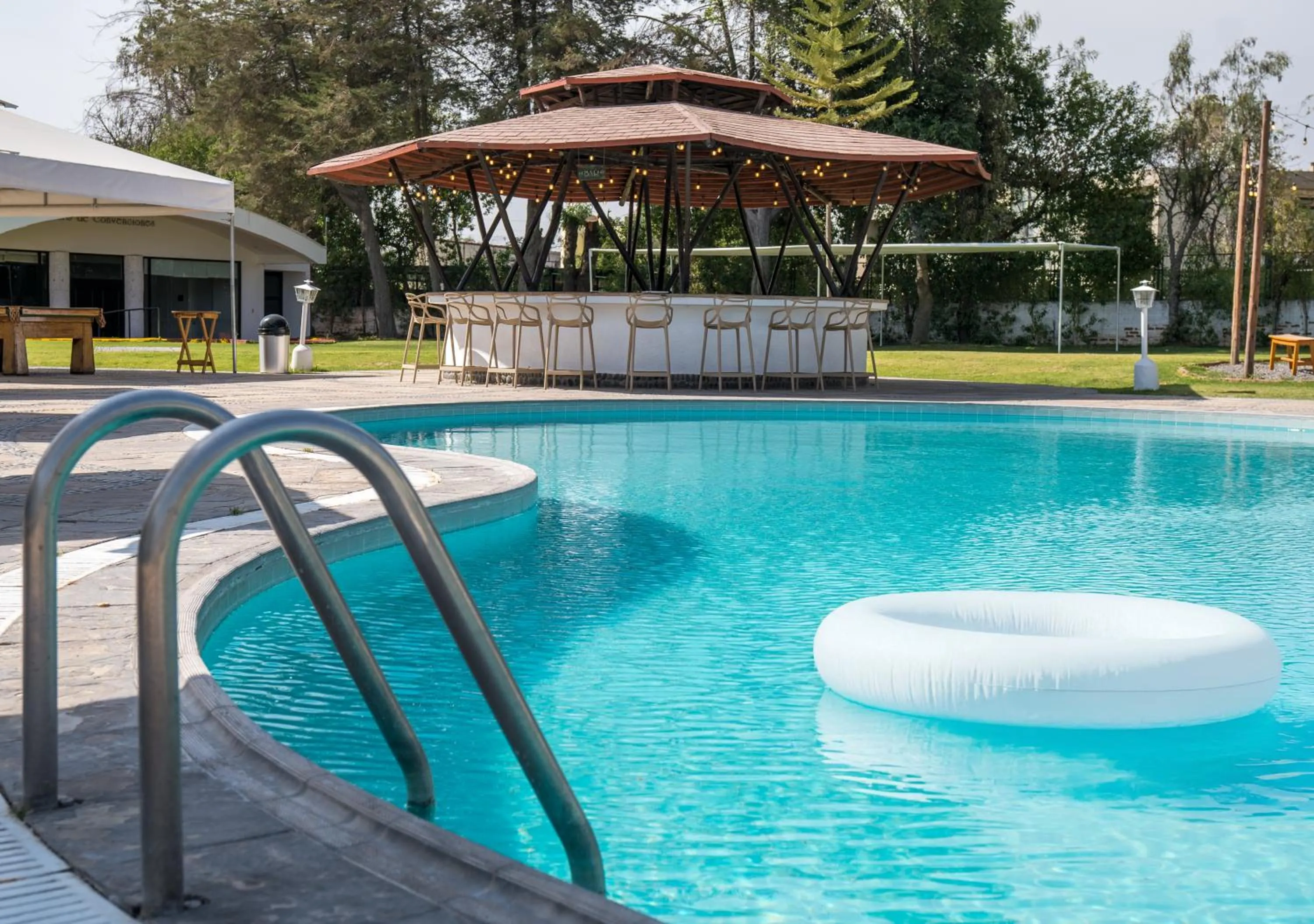 Swimming pool in El LAGO HOTEL by Luoxo