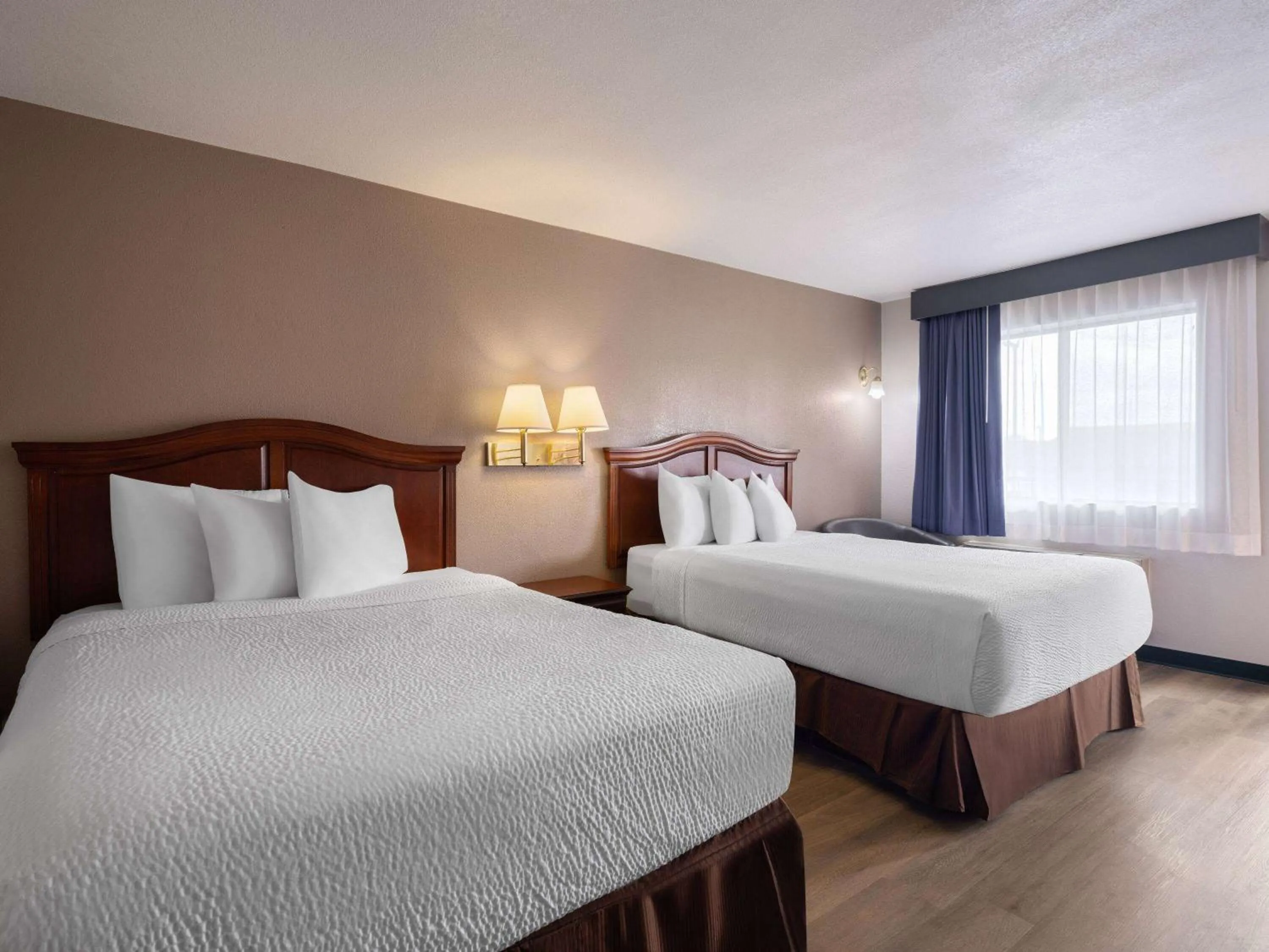 Photo of the whole room, Bed in Travelodge by Wyndham Tucson AZ