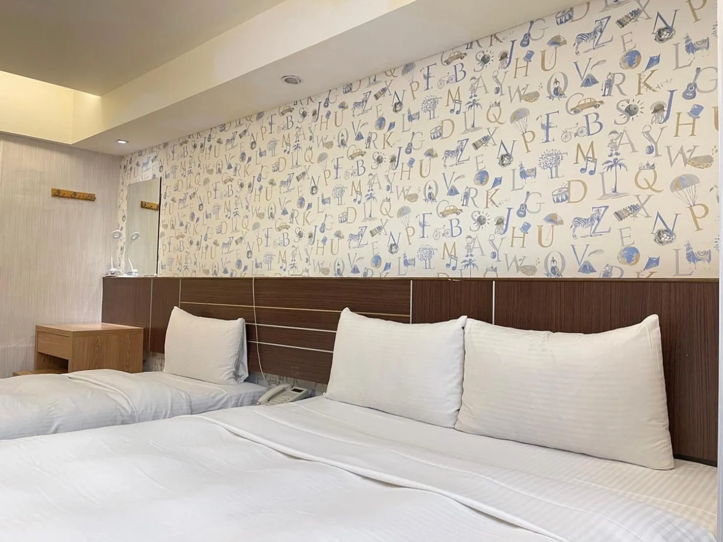 Bed in Jung Shin Hotel