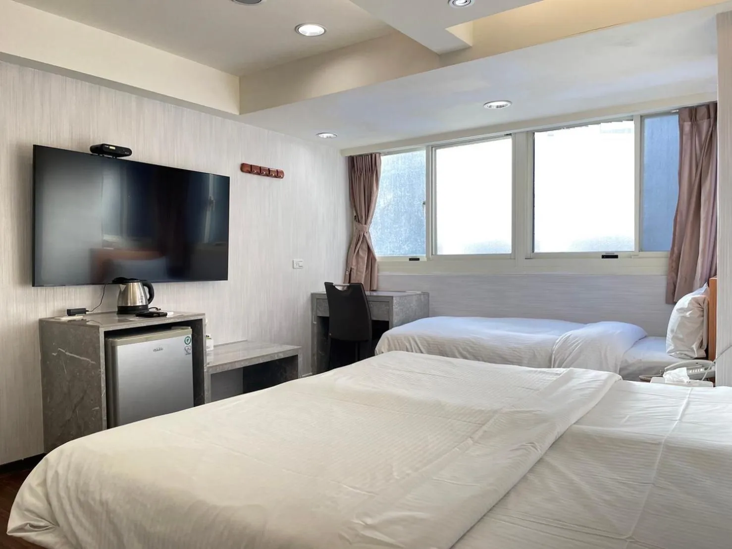 Bed in Jung Shin Hotel