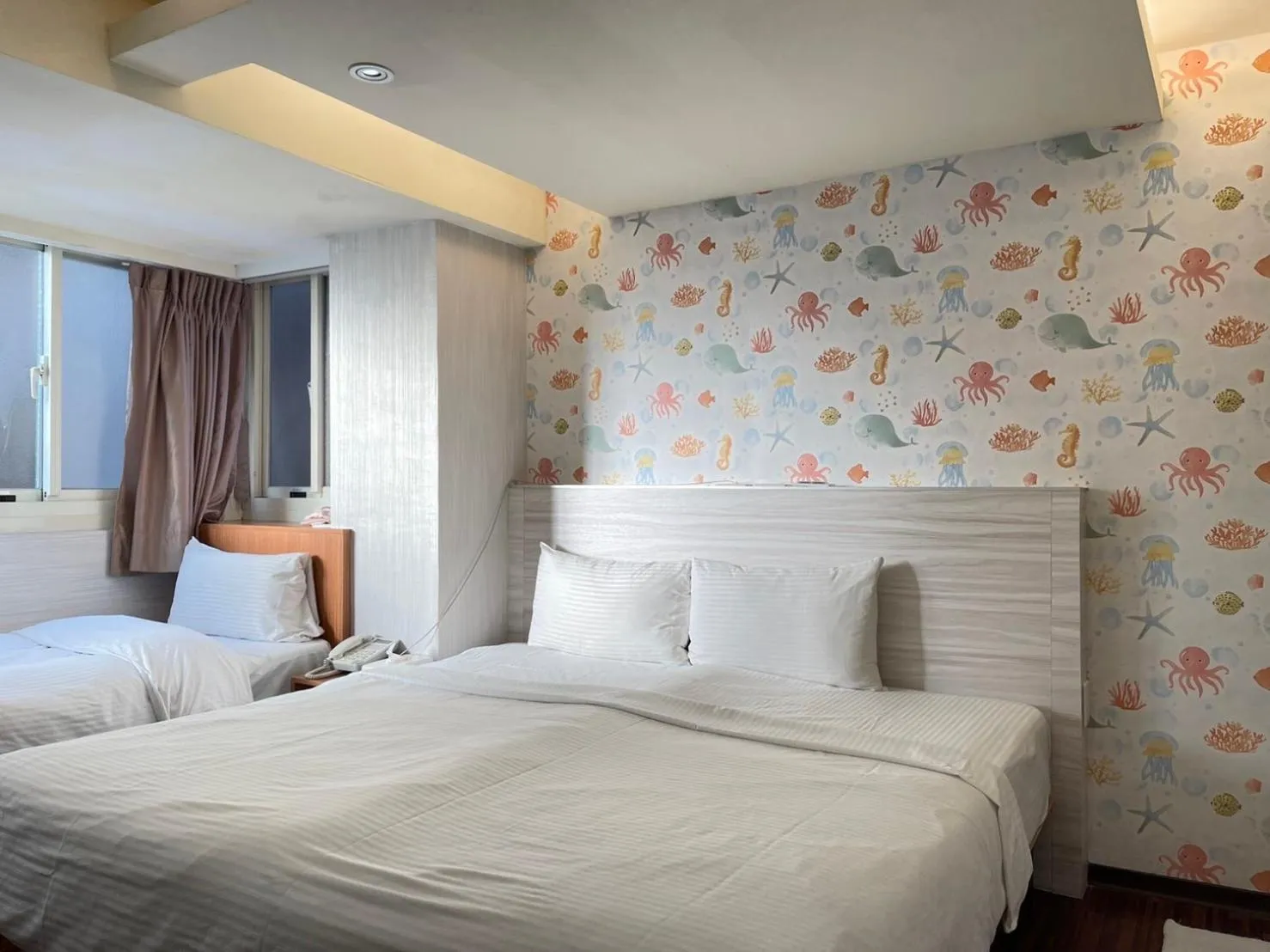 Bed in Jung Shin Hotel