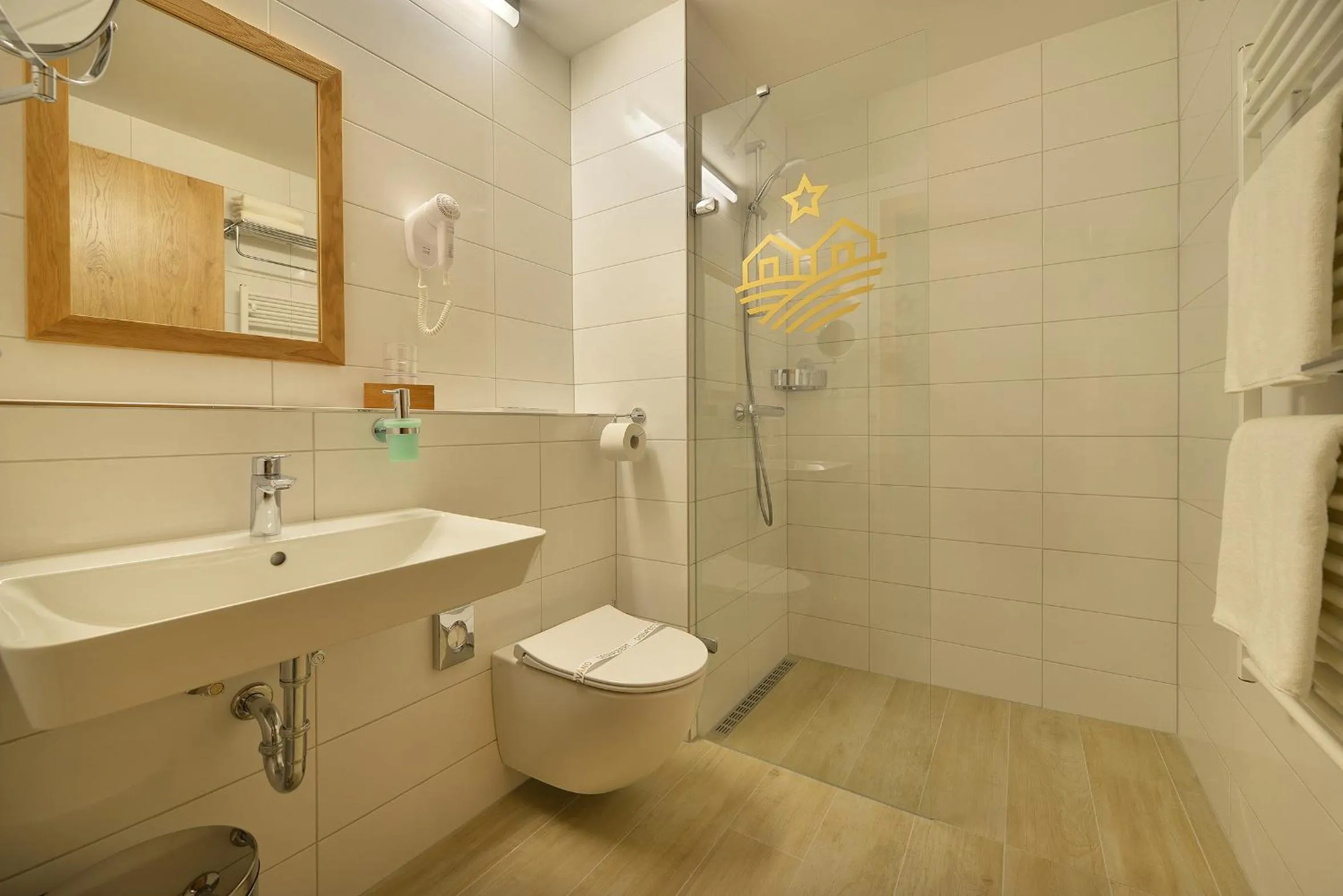 Bathroom in Wellness Hotel Happy Star