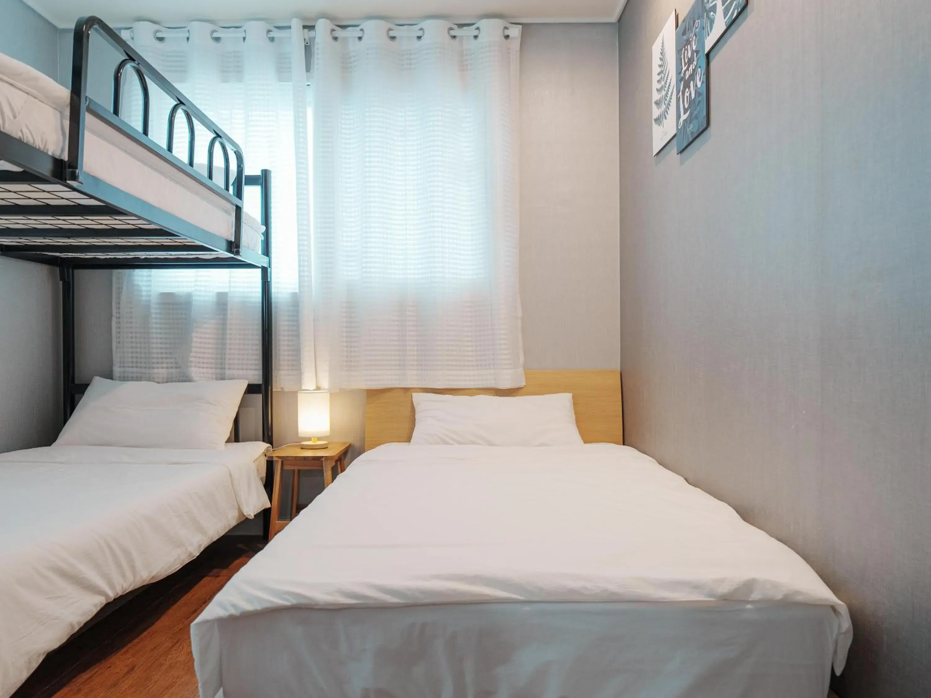 Triple Room with Private Bathroom in Rain Boots Guest House Triple Room with Private Bathroom in Rain Boots Guest House