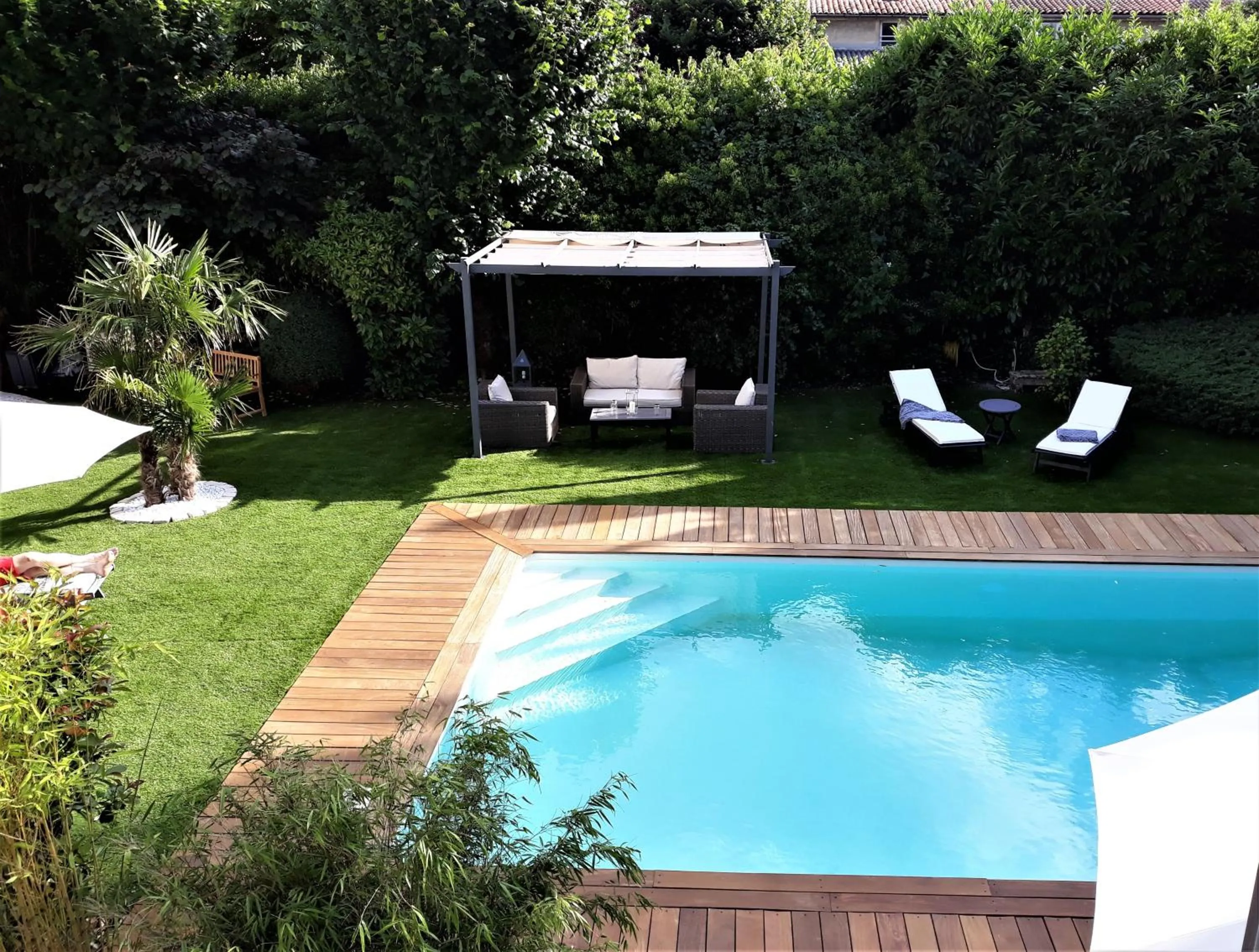 Pool view in Chambres d'Hôtes Maison La Porte Rouge