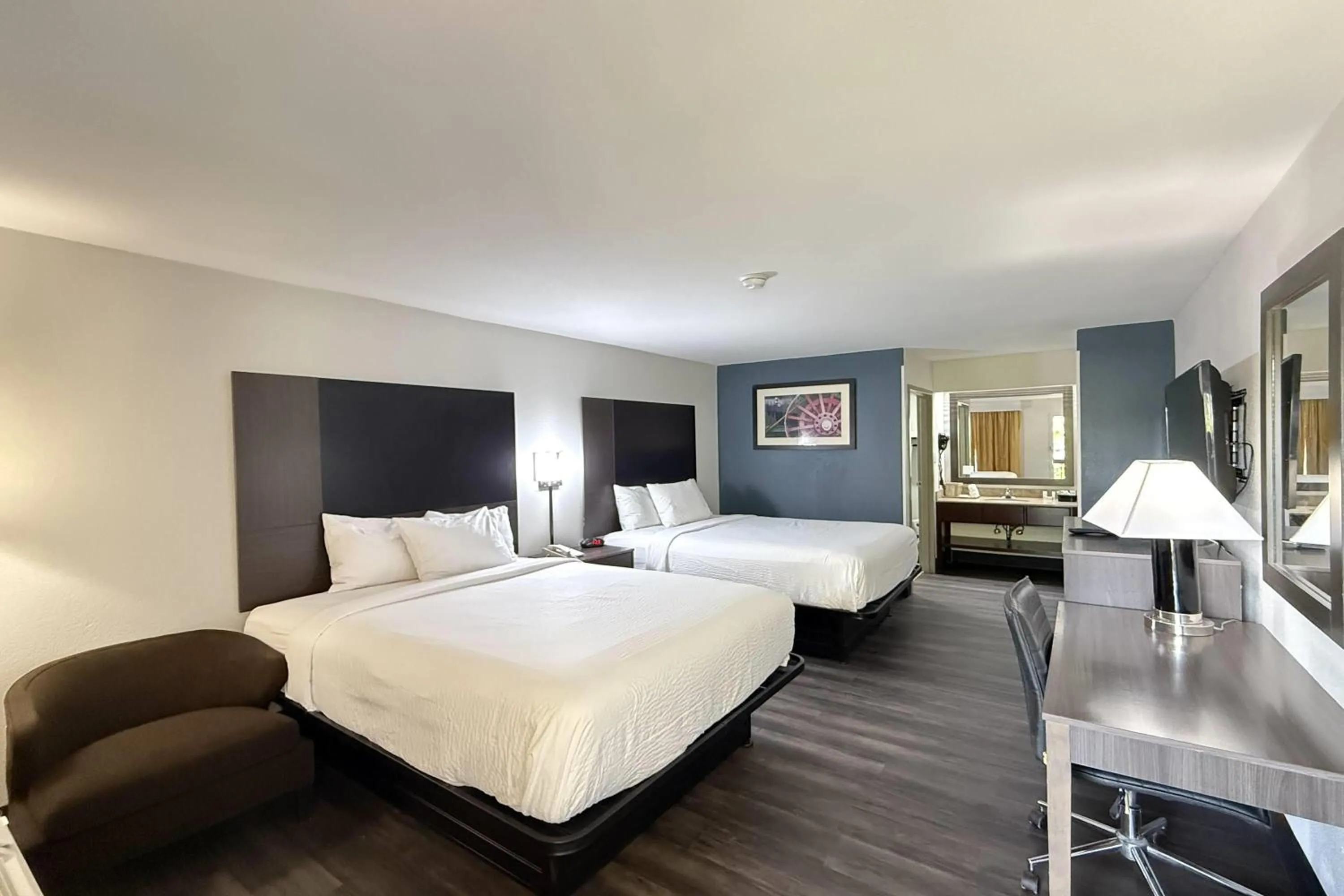 Photo of the whole room, Bed in Baymont by Wyndham Tallahassee