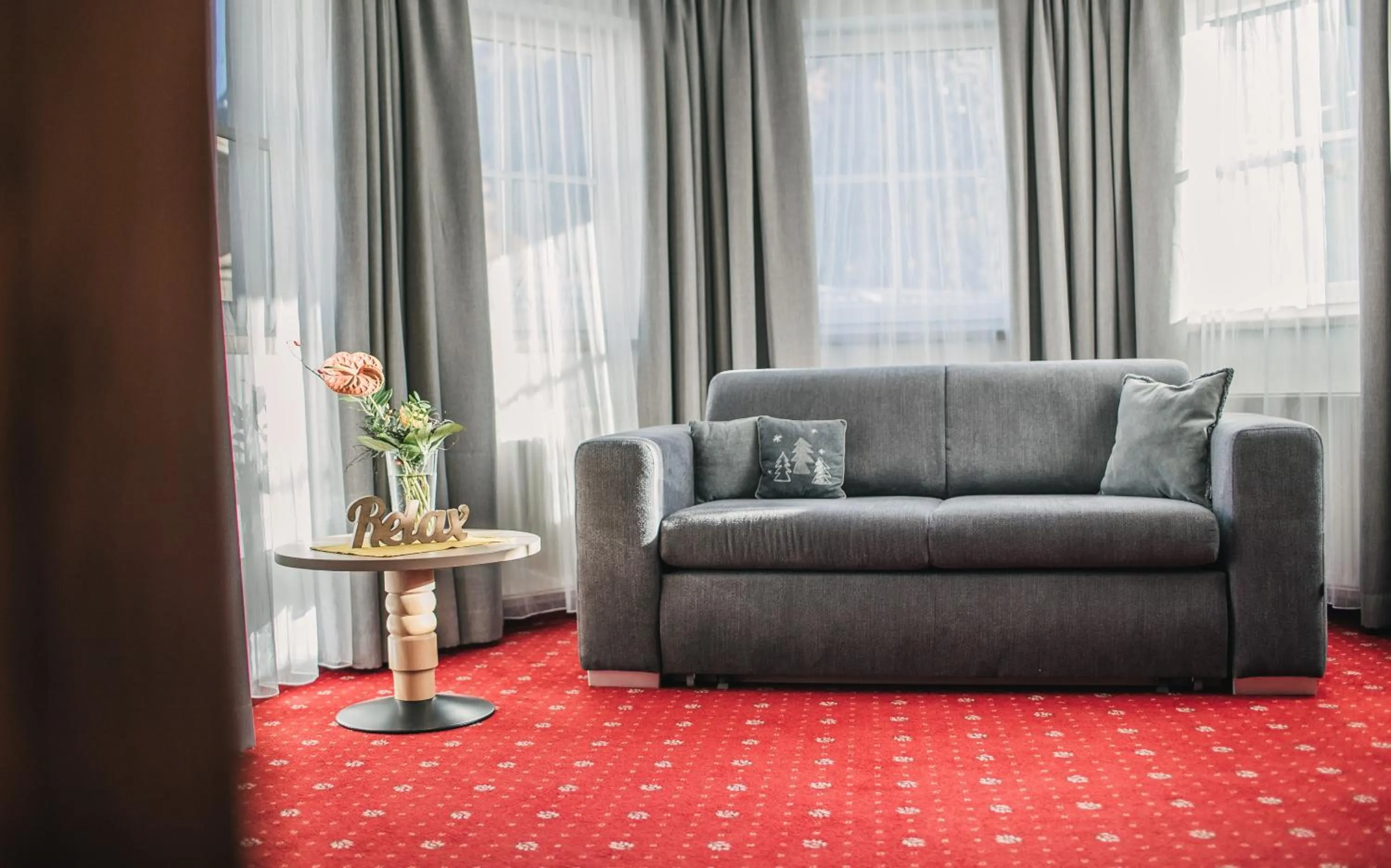 Living room in Arlen Lodge Hotel-Garni