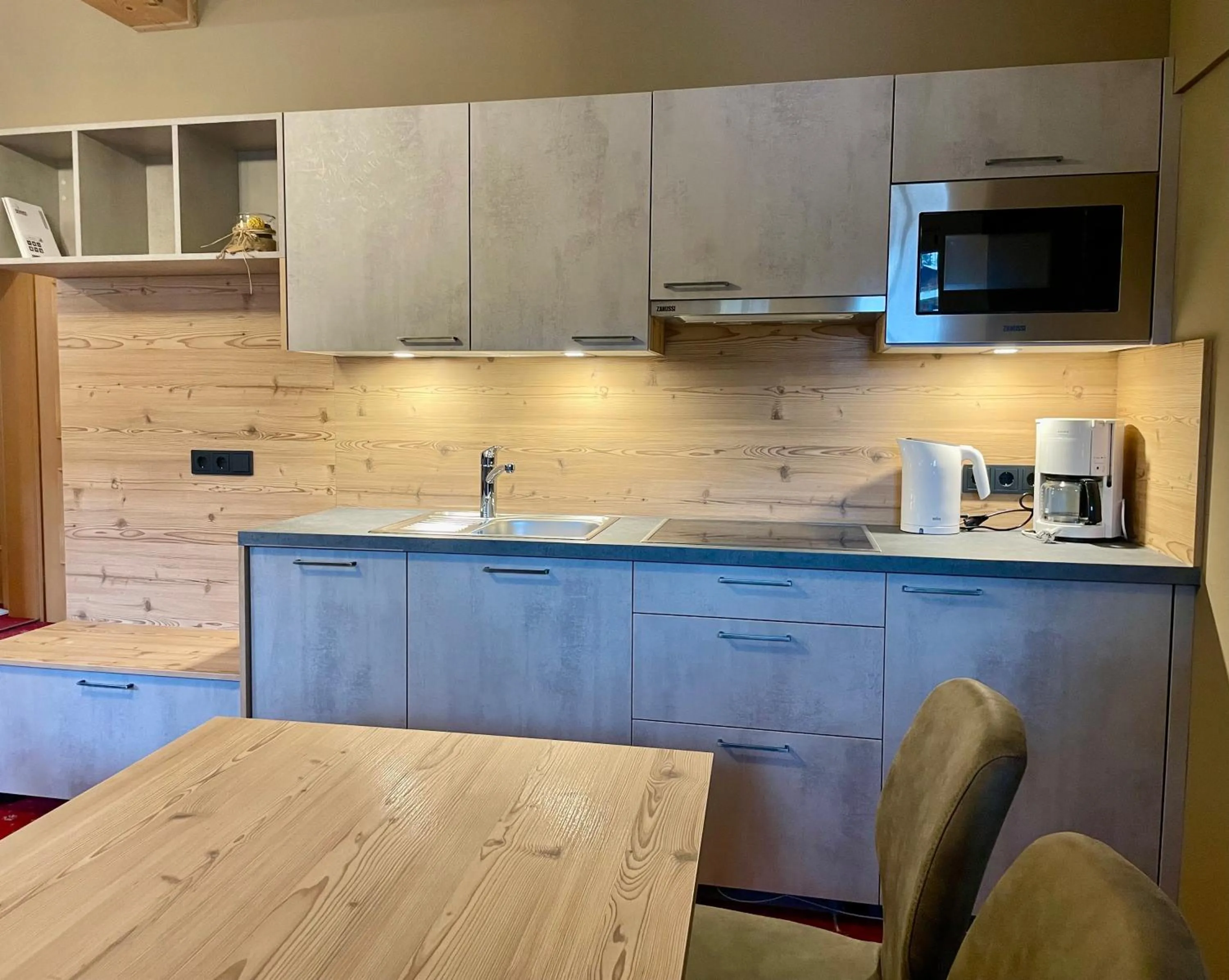 Kitchen or kitchenette in Arlen Lodge Hotel-Garni