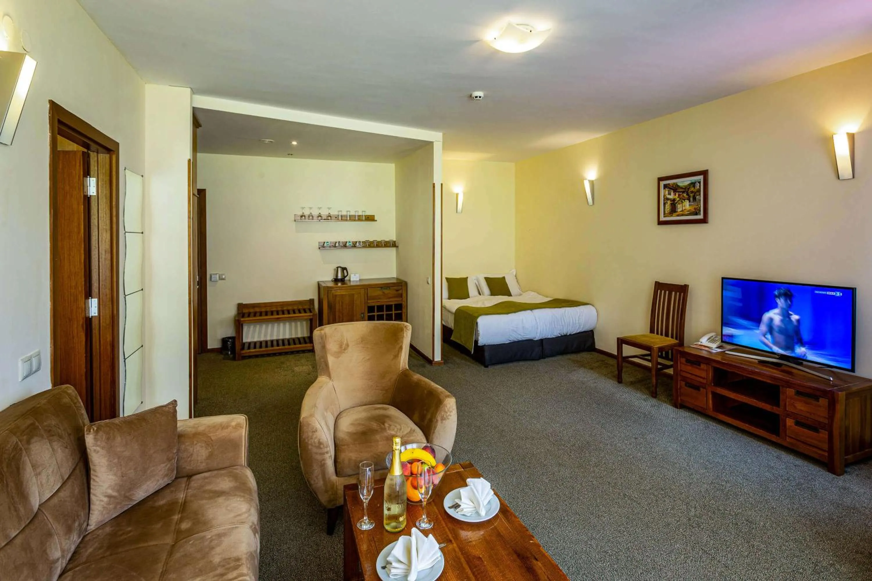 Living room, Bed in Musala Hotel