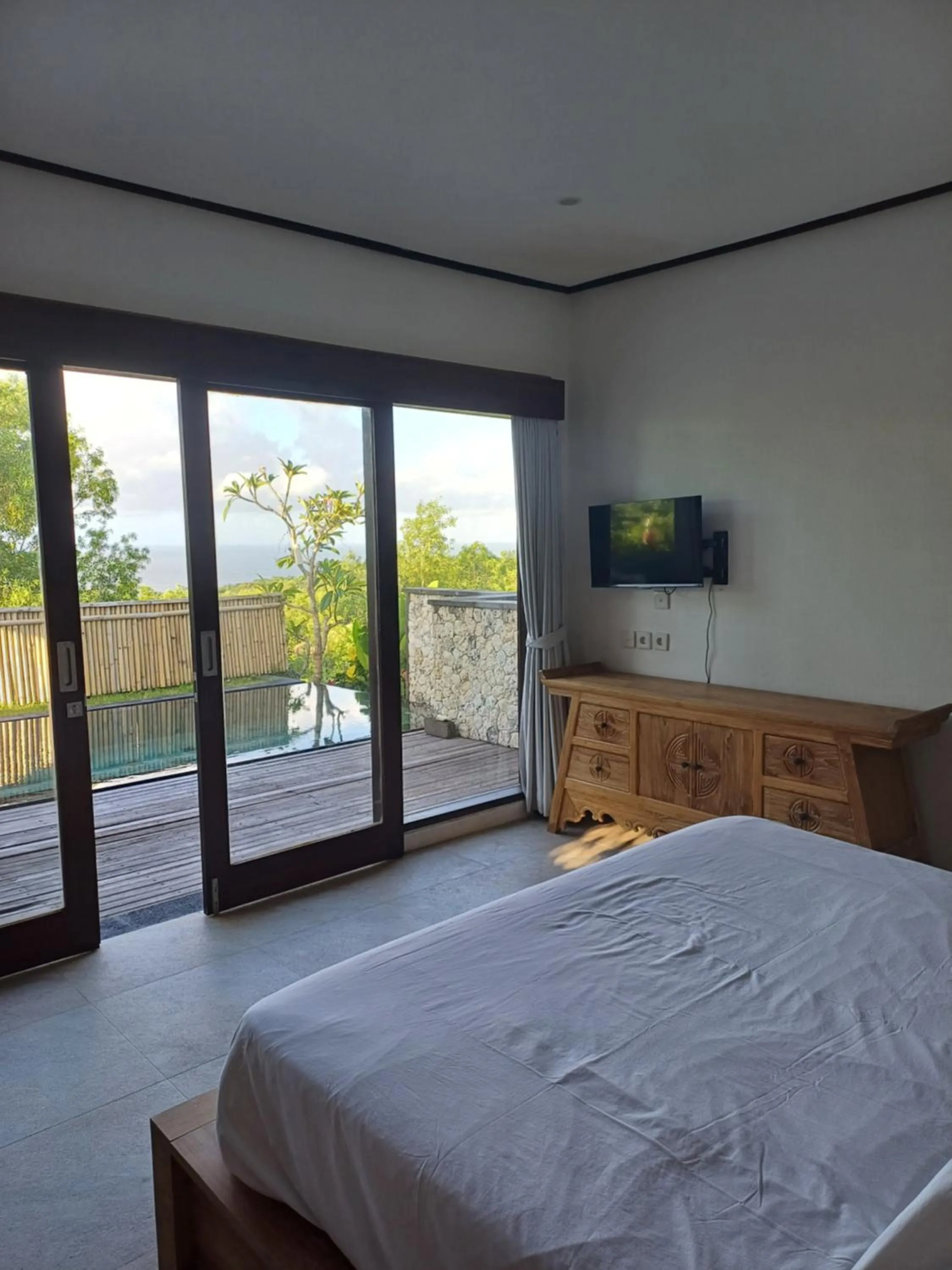 Bed in Green Bowl Beach Villas