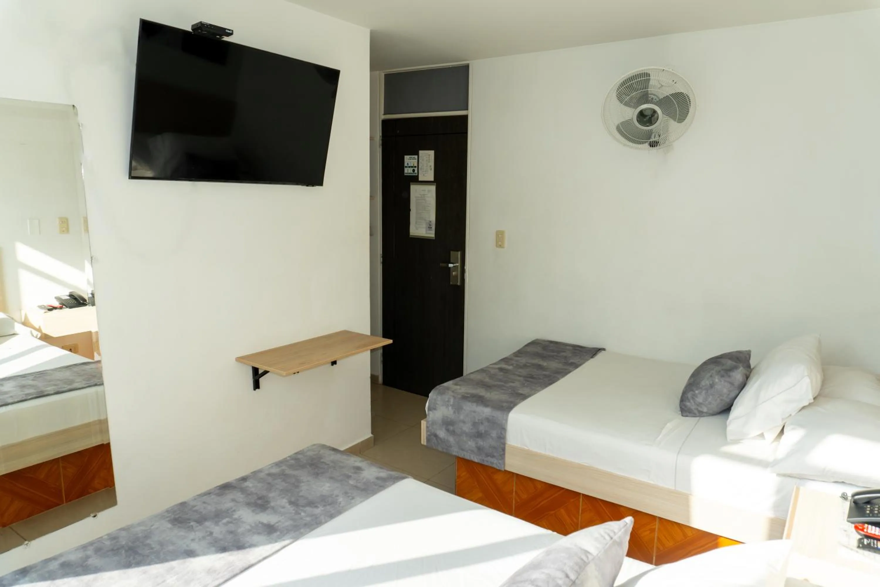 Bed in Hotel Alcaravan Medellín