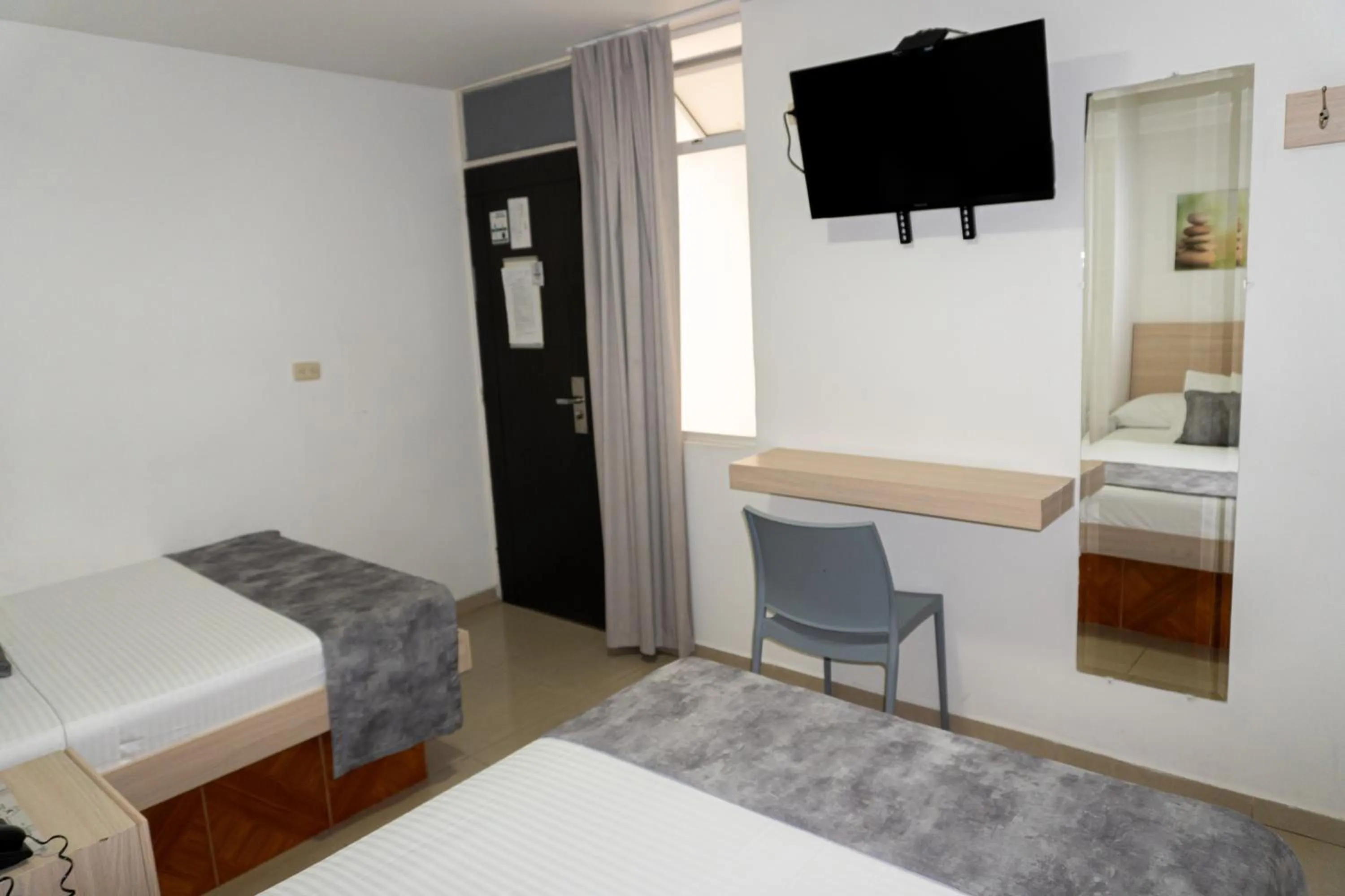 Bed in Hotel Alcaravan Medellín