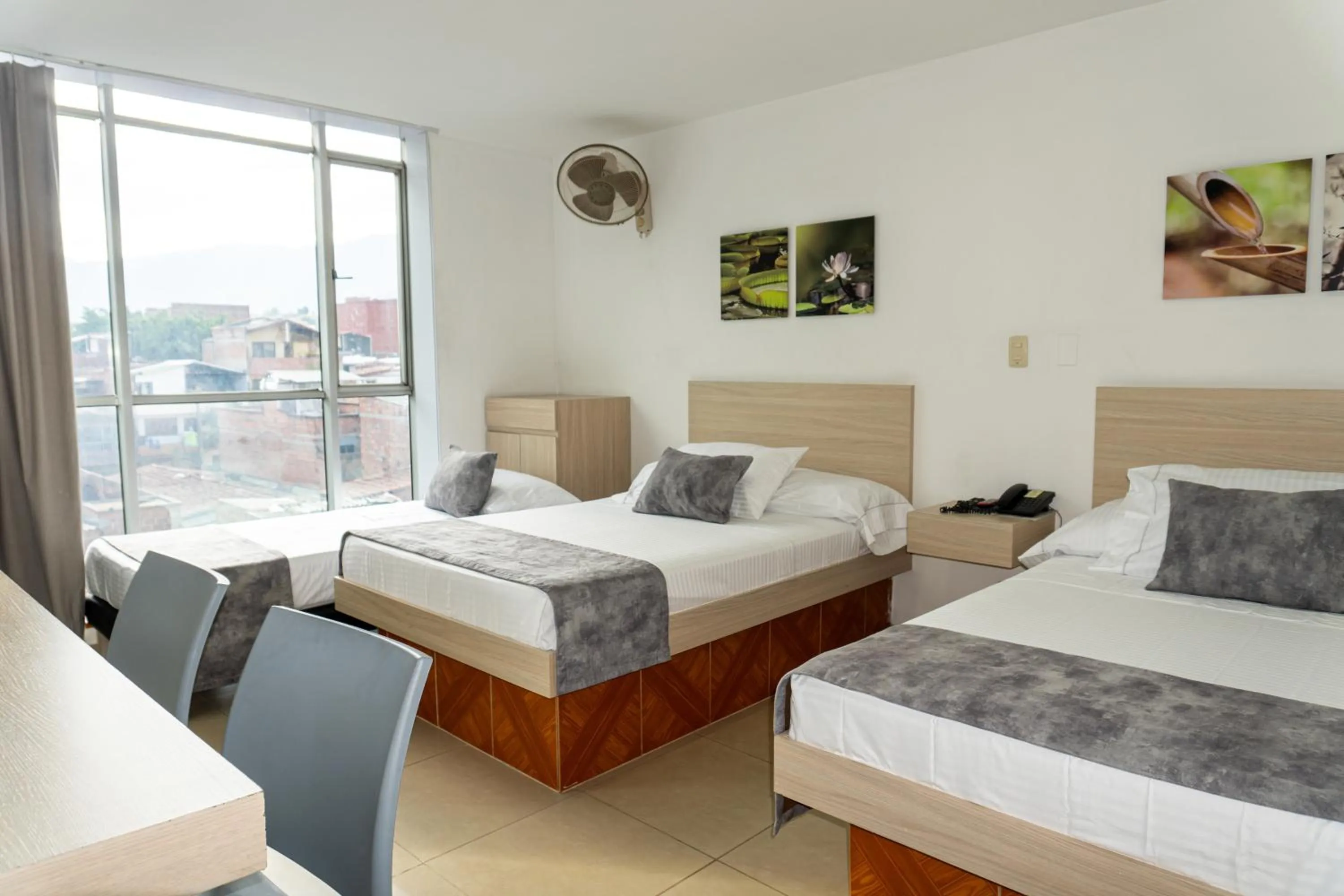 View (from property/room), Bed in Hotel Alcaravan Medellín