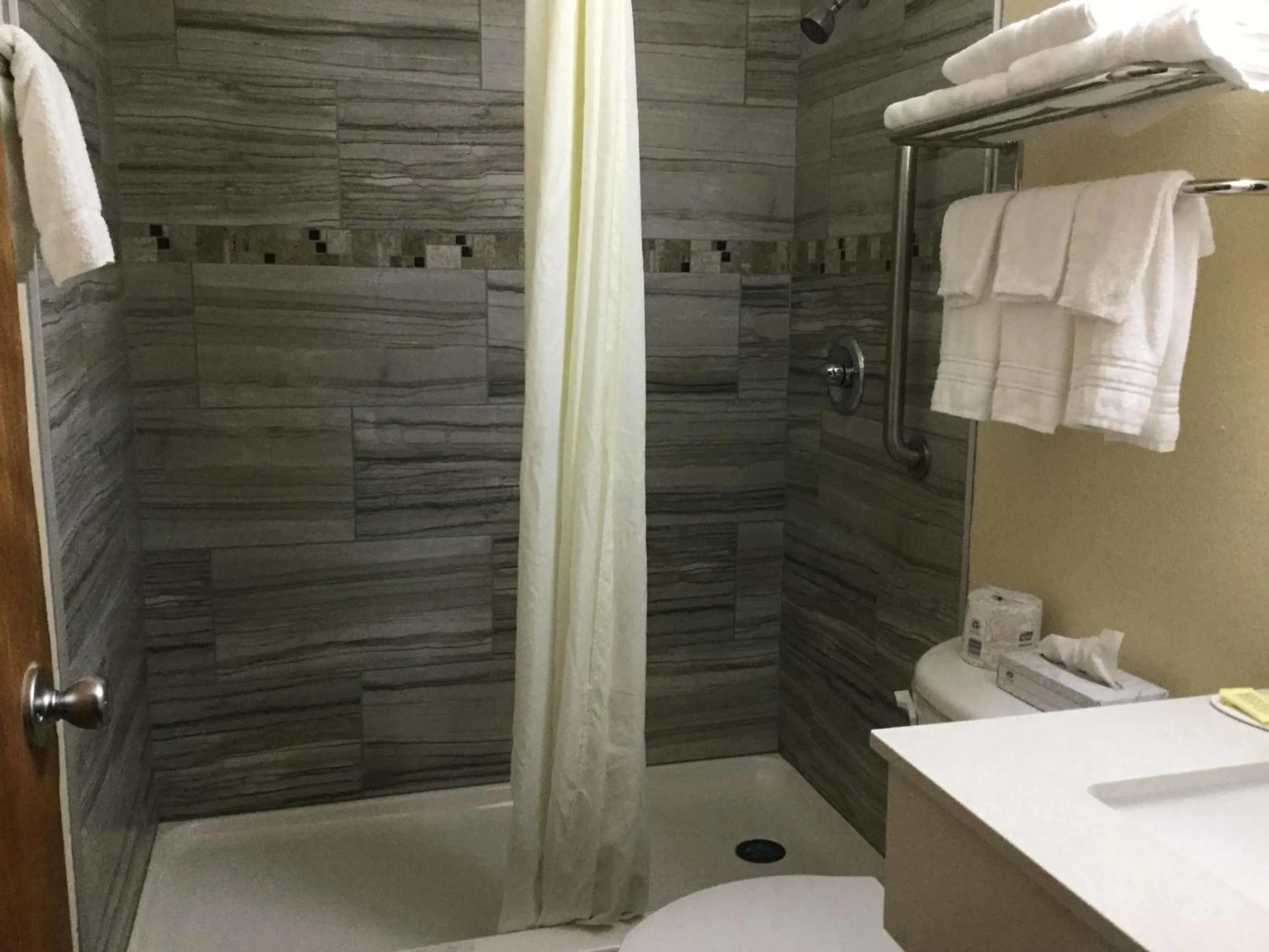 Bathroom in Super8 by Wyndham NEARBY Clearwater St Petersburg International Airport