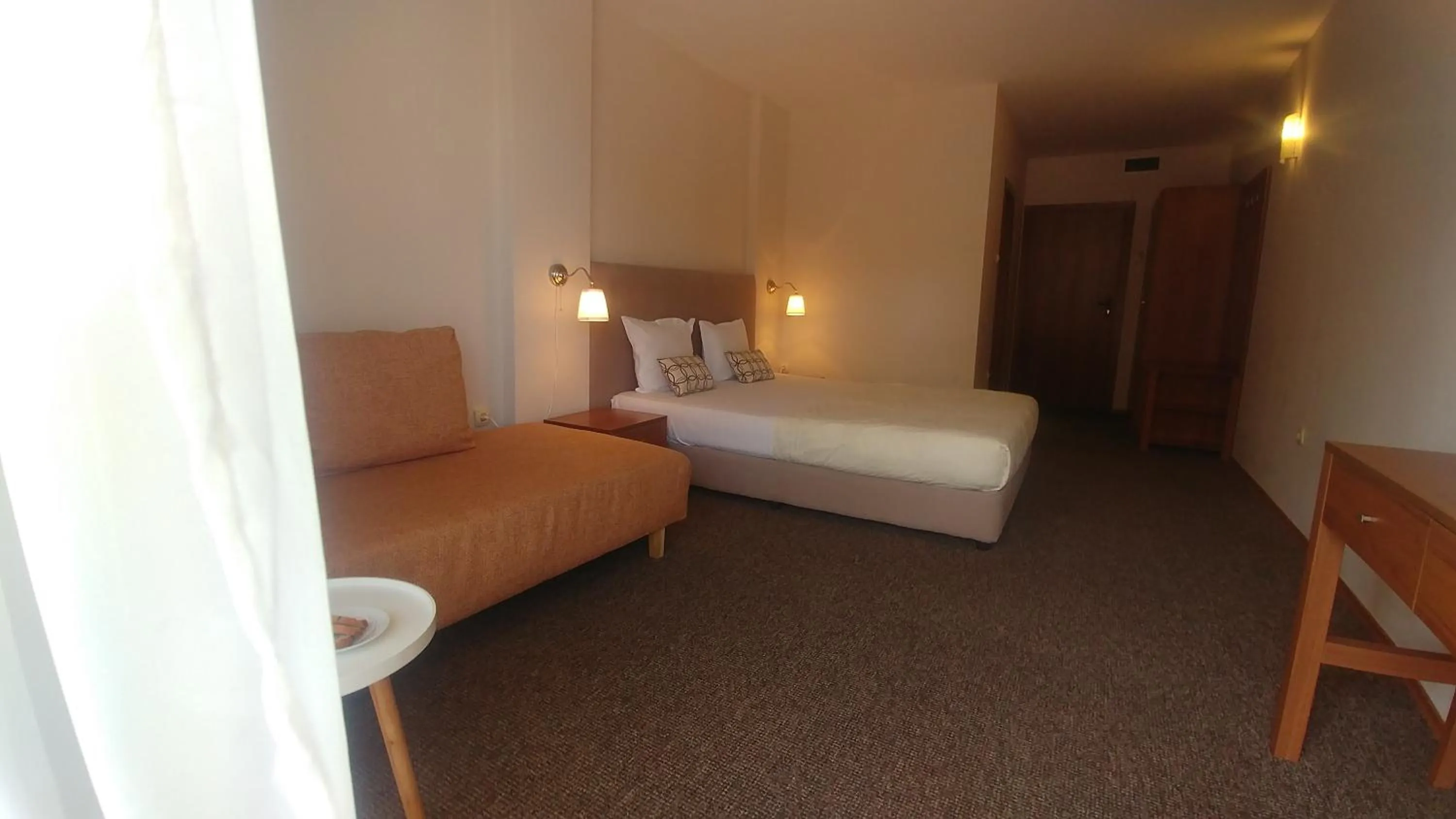 Seating area, Bed in Family Hotel Muses