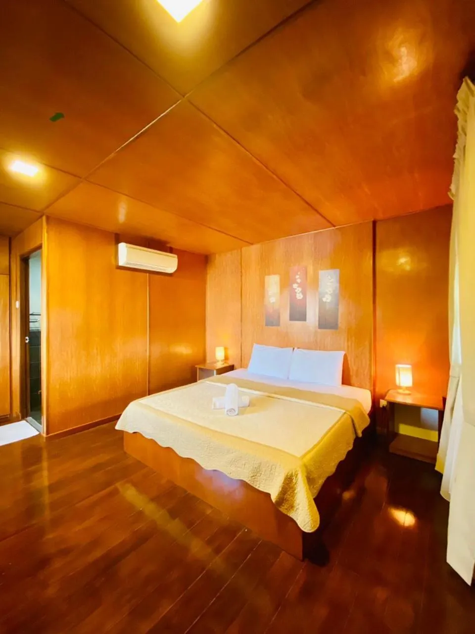 Bed in Landcons Hotel & Resort