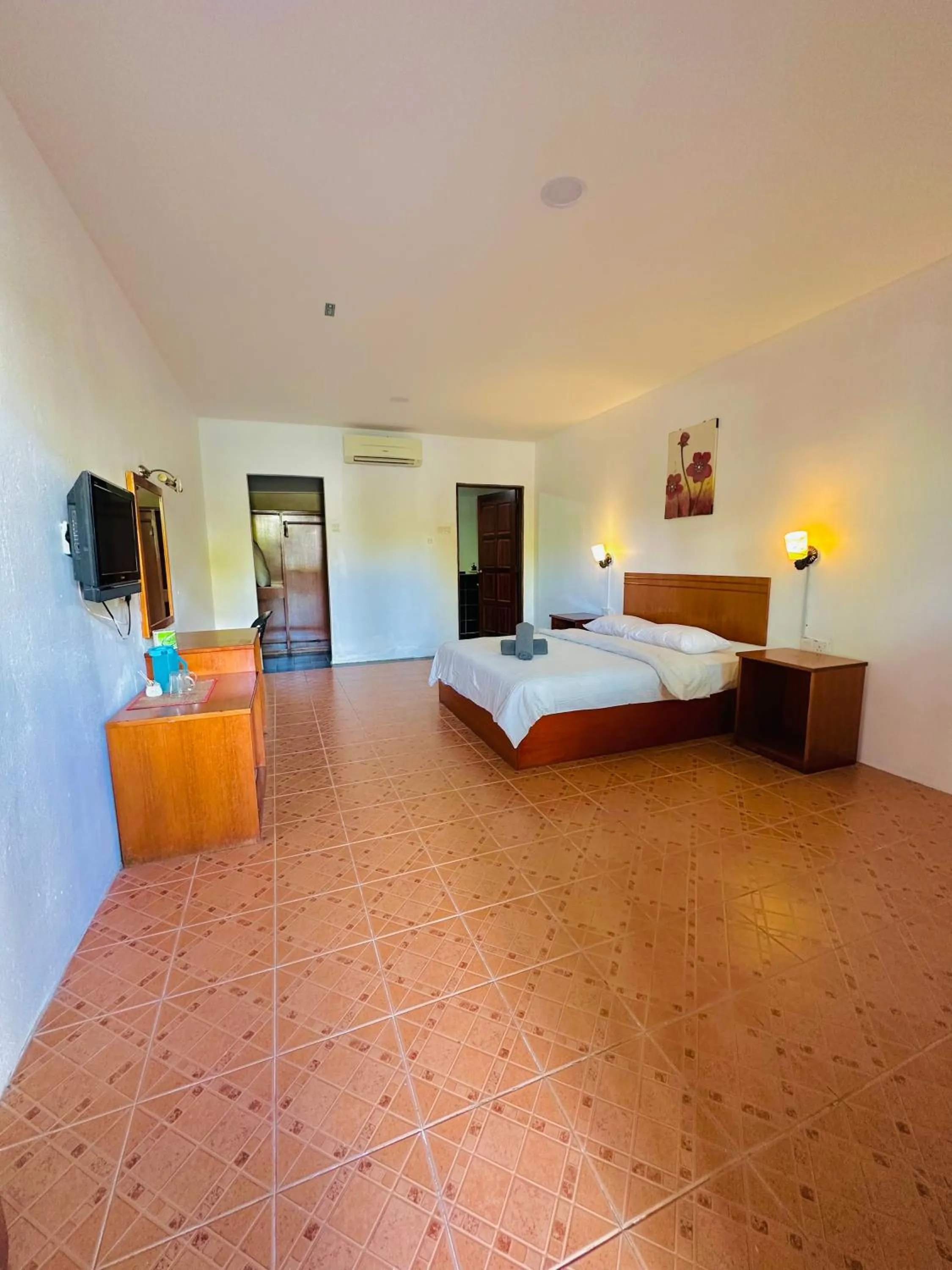 Bed in Landcons Hotel & Resort