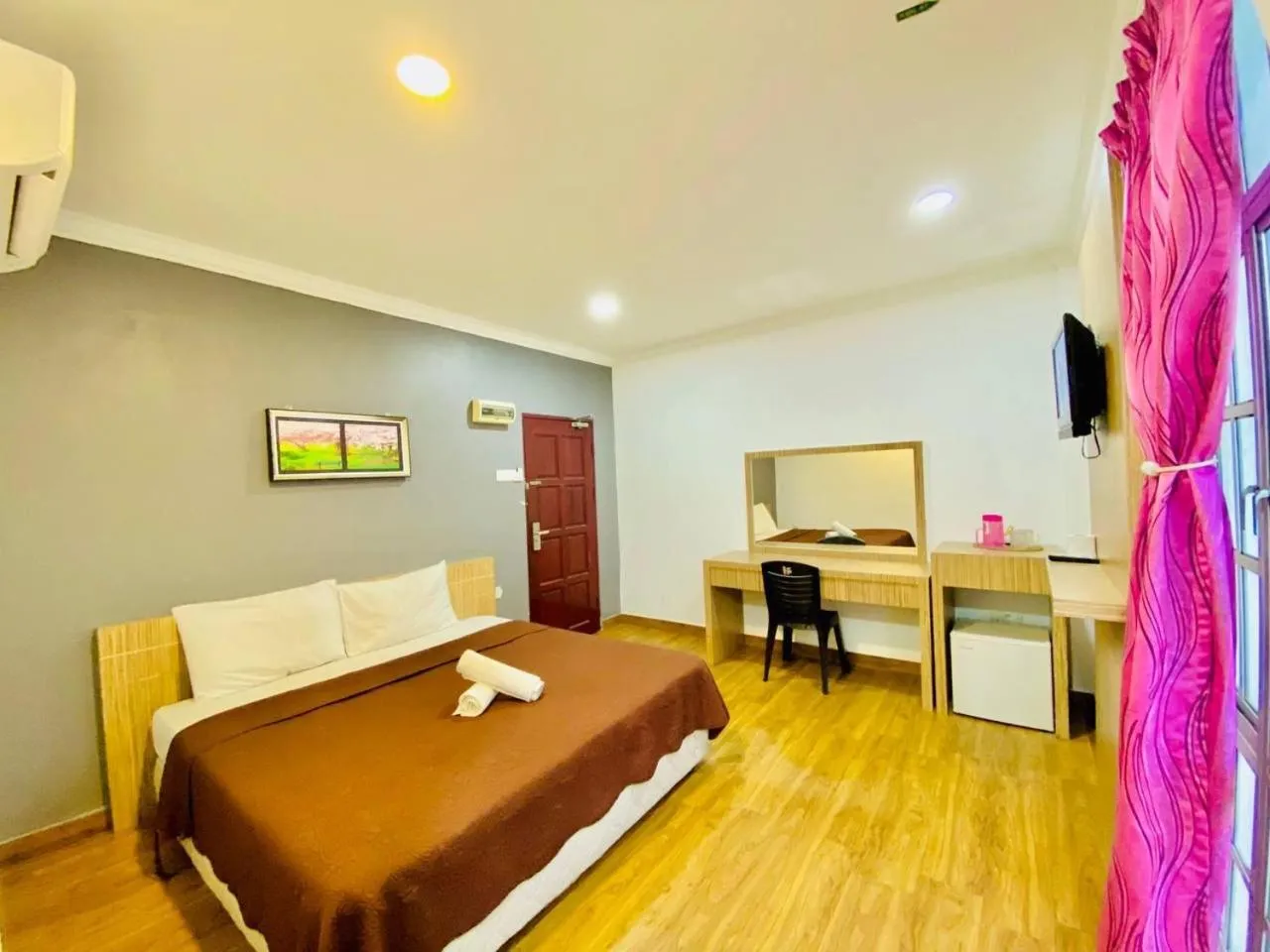 Bed in Landcons Hotel & Resort