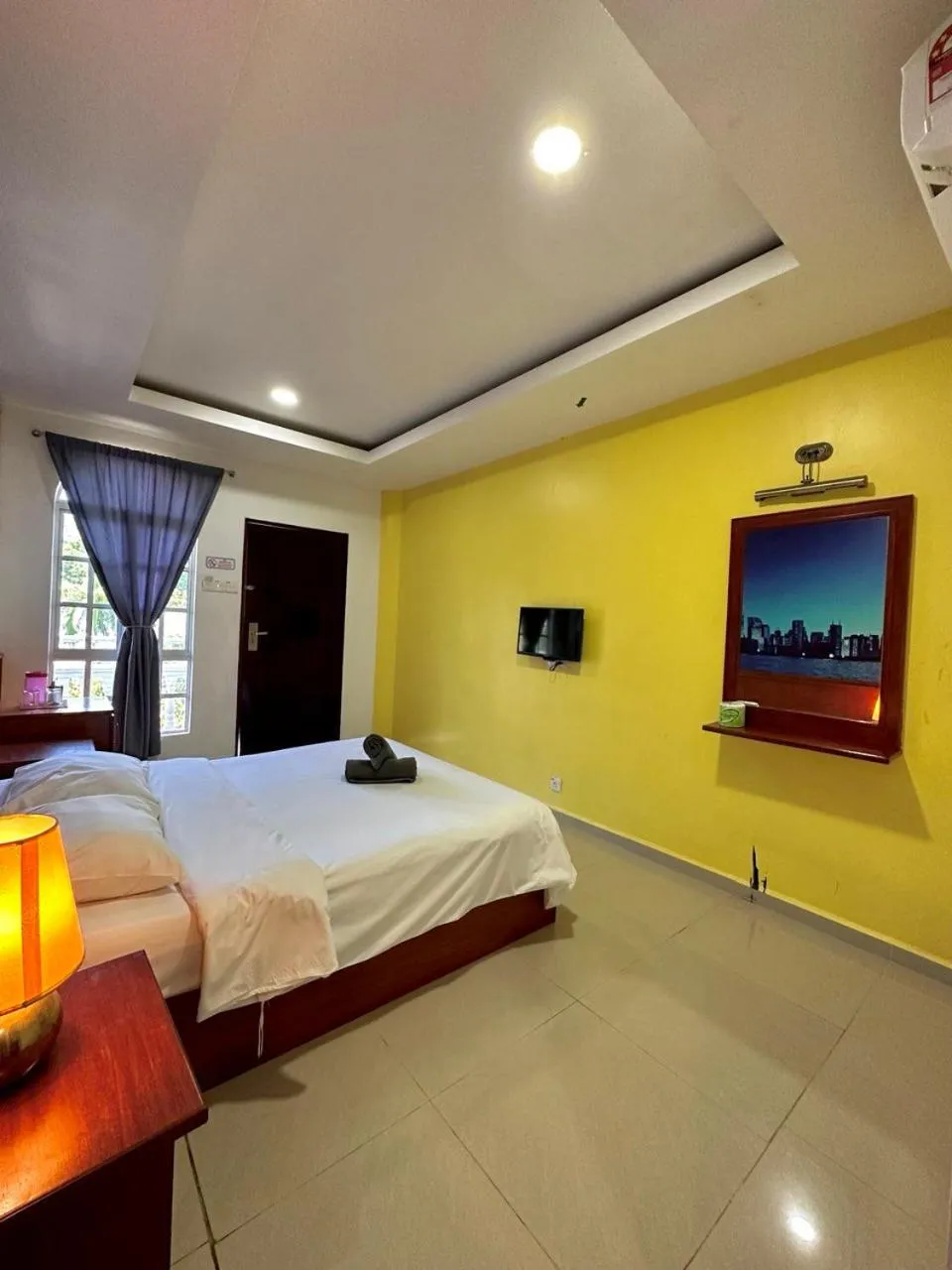 Bed in Landcons Hotel & Resort