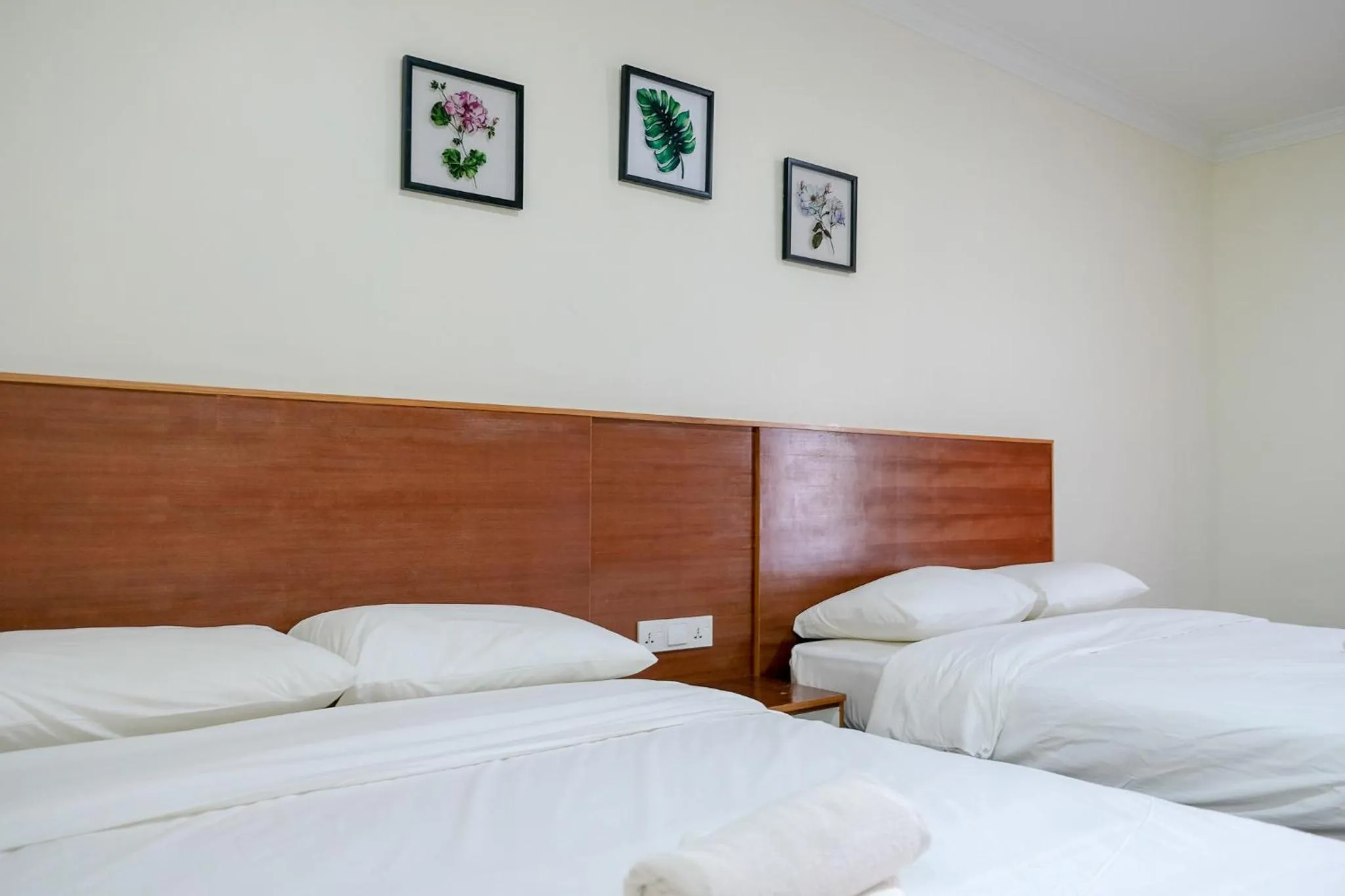 Bed in Landcons Hotel & Resort