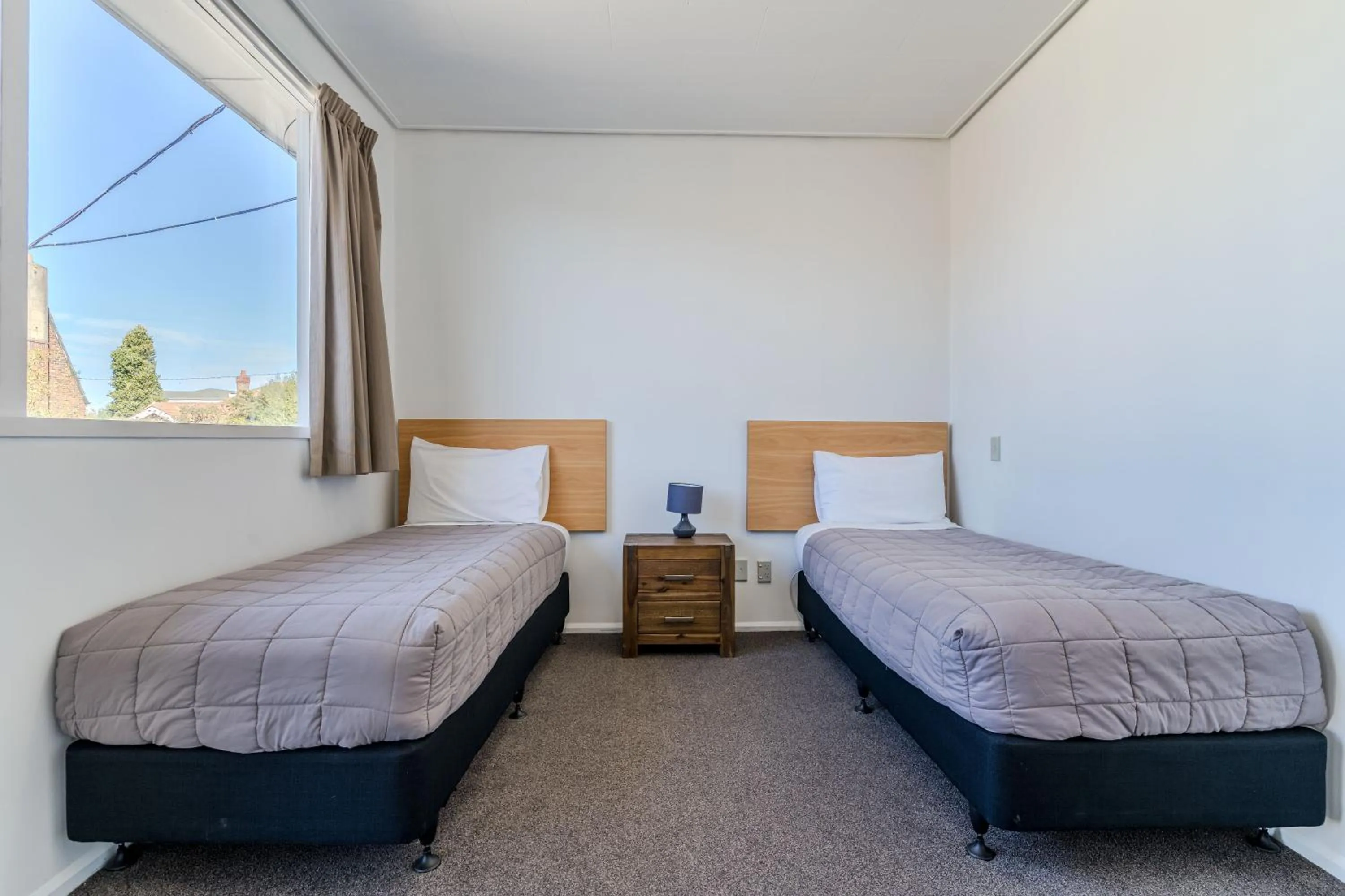 Bed in George Street Motel Apartments