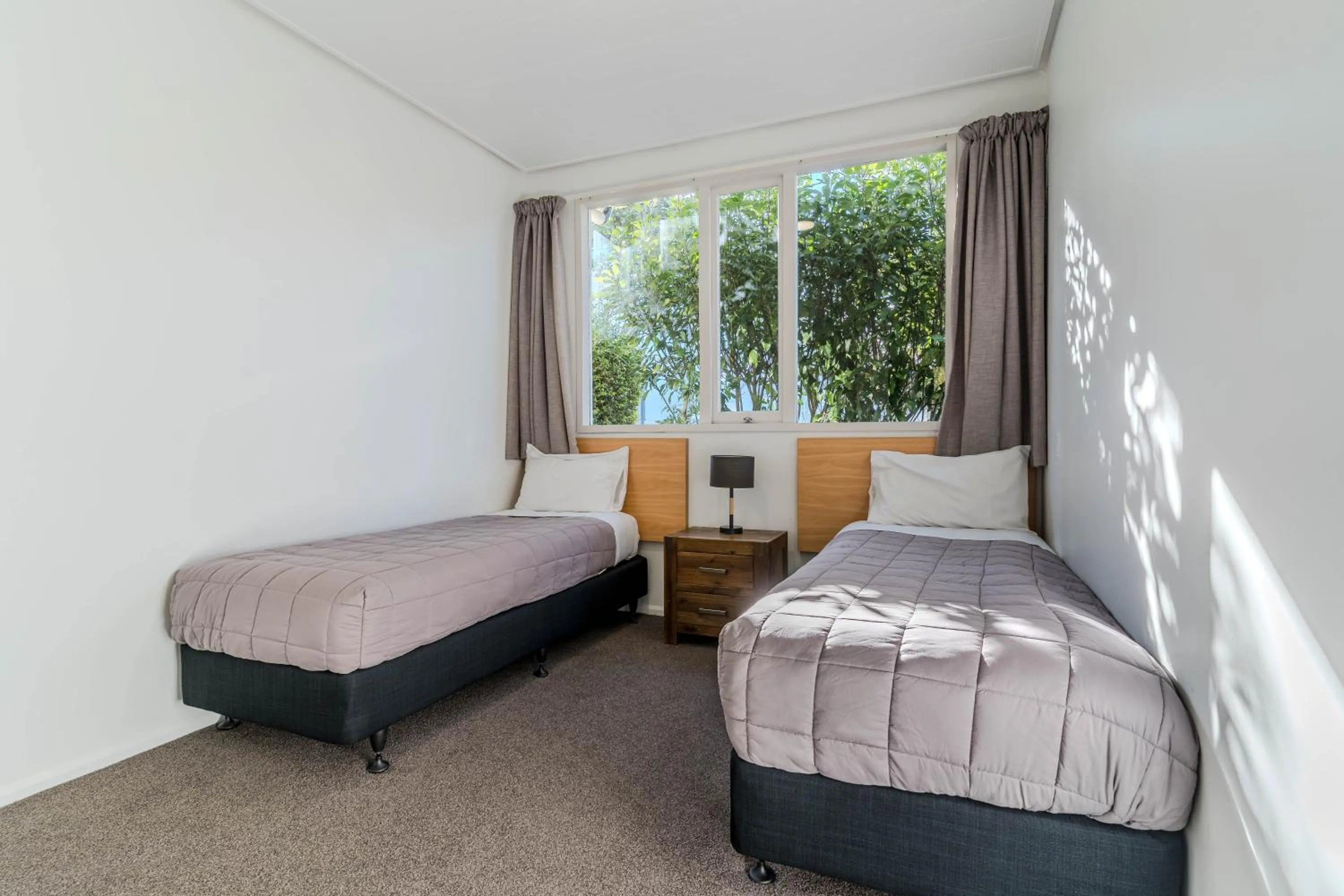 Bed in George Street Motel Apartments