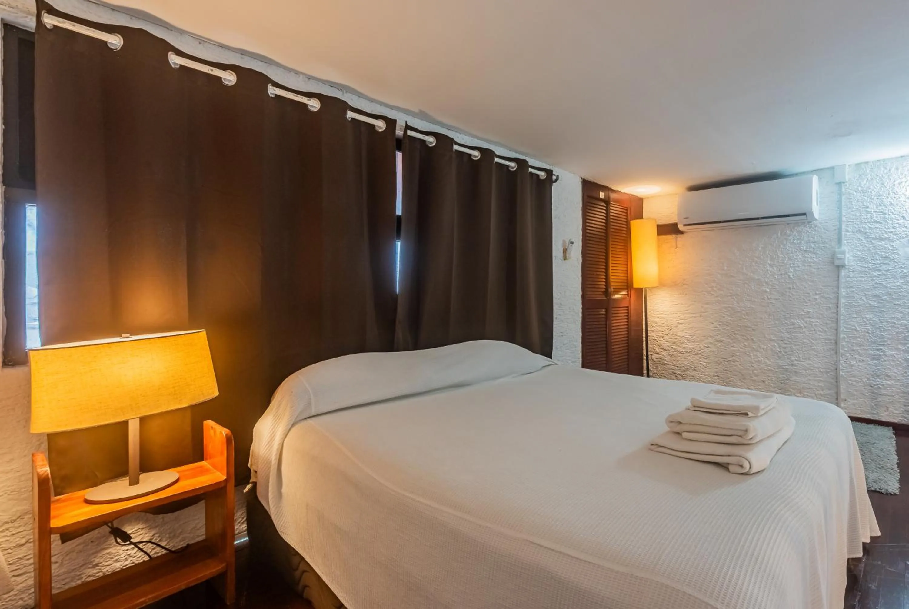 air conditioner, Bed in Cancún Suites Apartments - Hotel Zone