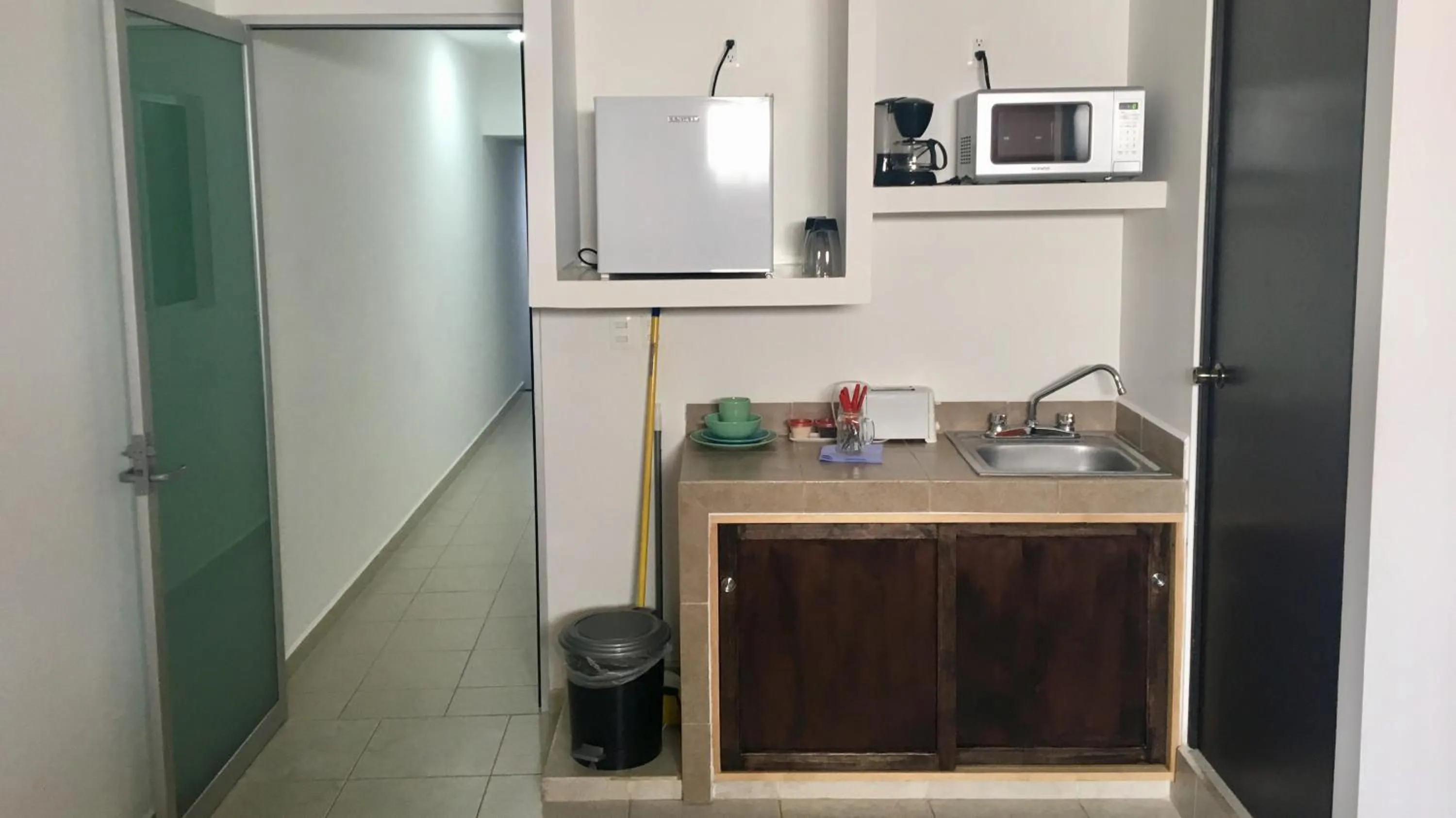 Kitchen or kitchenette in Cancún Suites Apartments - Hotel Zone