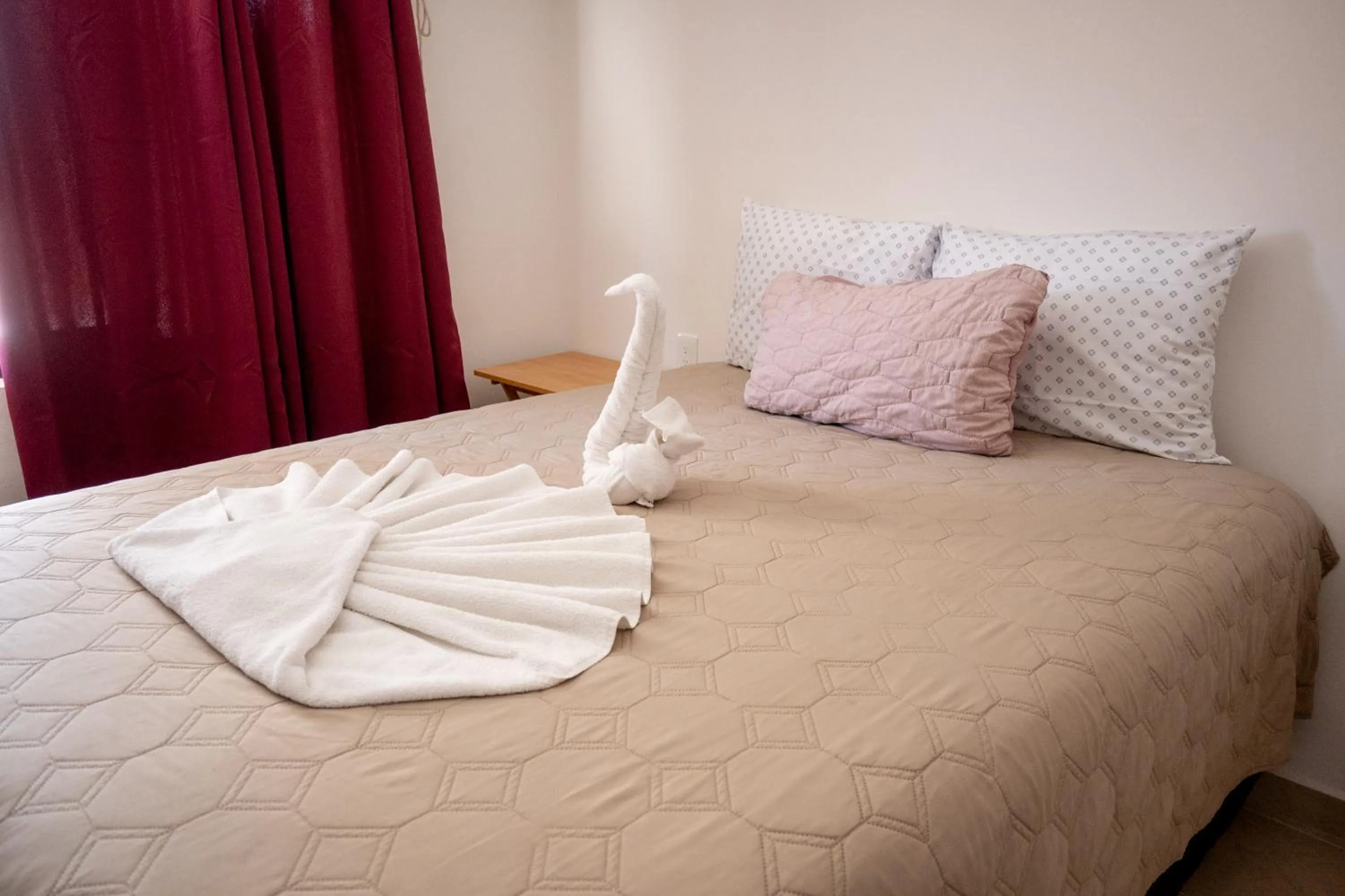 Bed in Cancún Suites Apartments - Hotel Zone