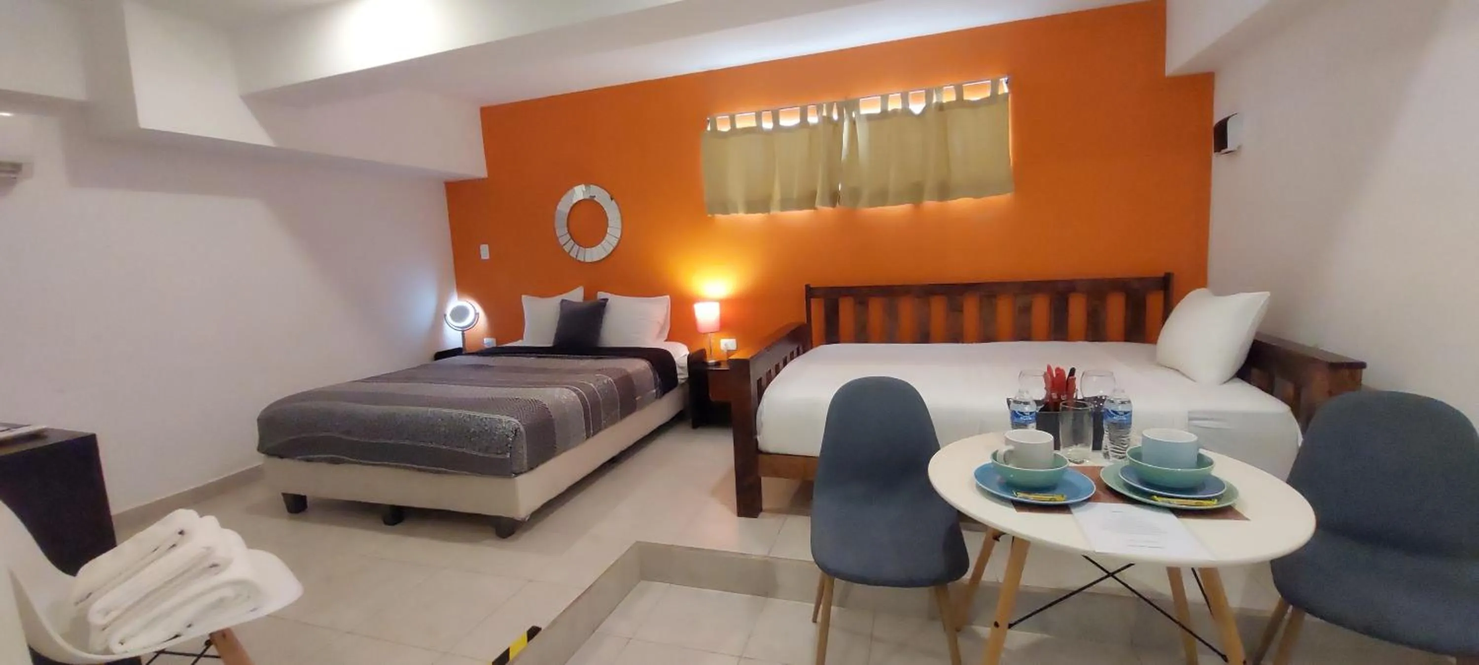 Photo of the whole room, Bed in Cancún Suites Apartments - Hotel Zone
