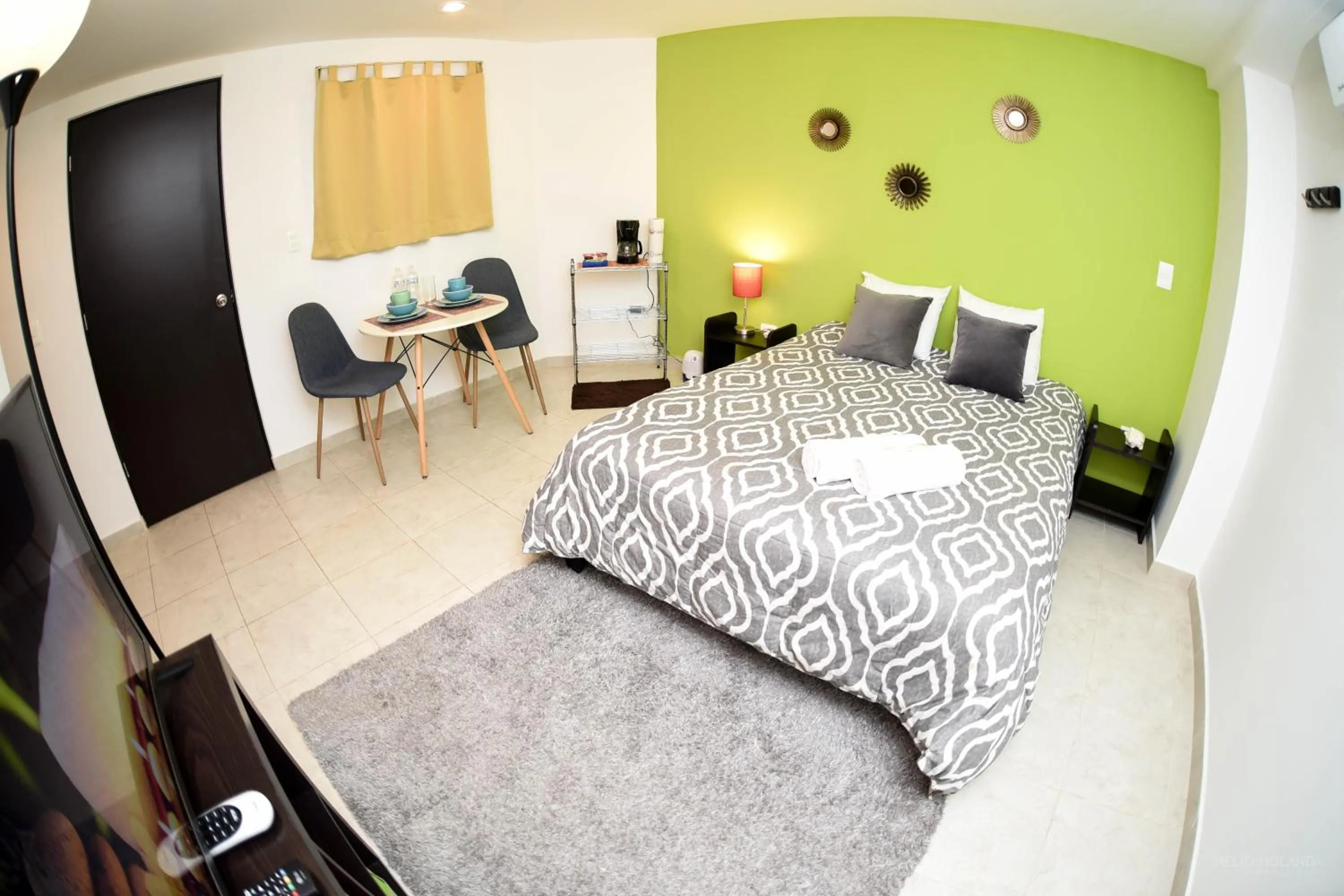 Photo of the whole room, Bed in Cancún Suites Apartments - Hotel Zone