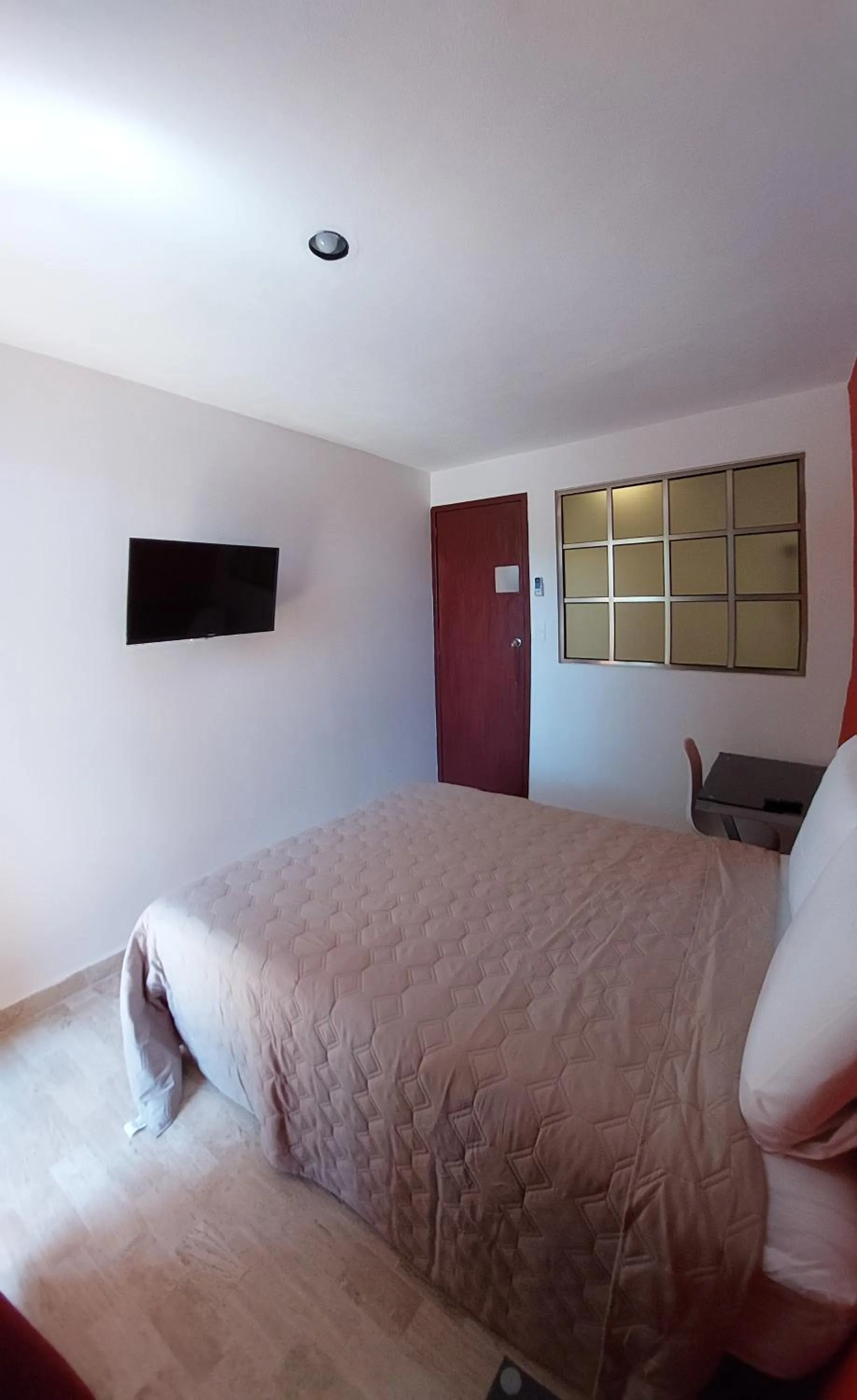 Photo of the whole room, Bed in Cancún Suites Apartments - Hotel Zone