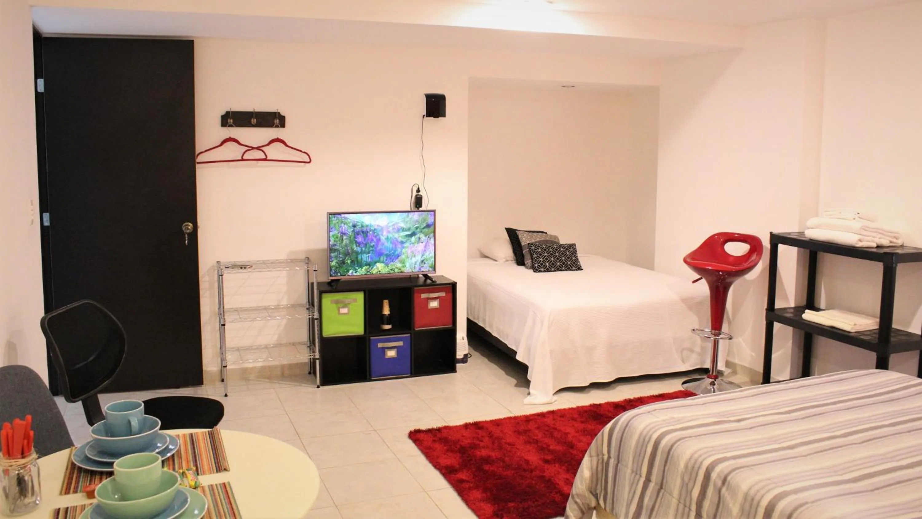 Photo of the whole room, Bed in Cancún Suites Apartments - Hotel Zone