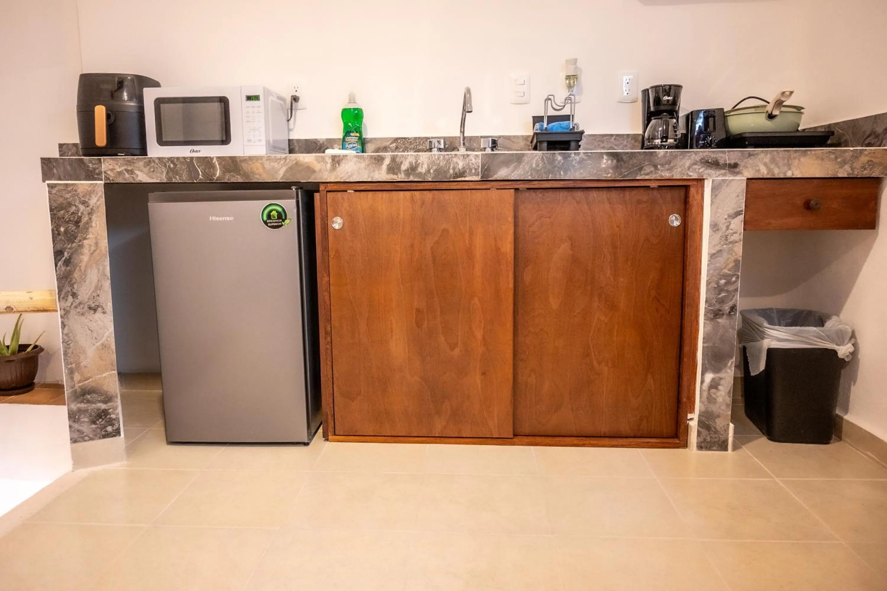 Kitchen or kitchenette in Cancún Suites Apartments - Hotel Zone