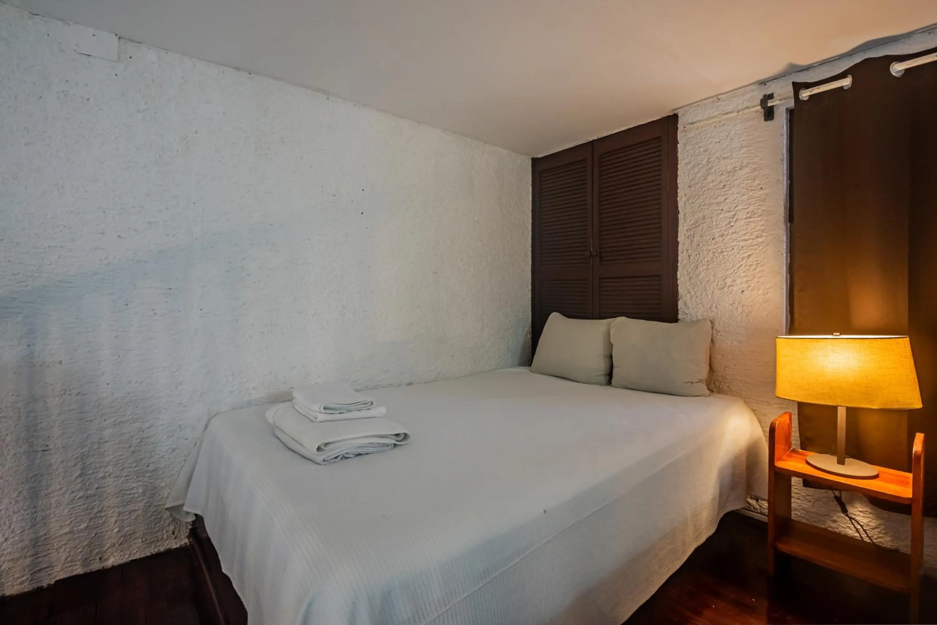 Bed in Cancún Suites Apartments - Hotel Zone