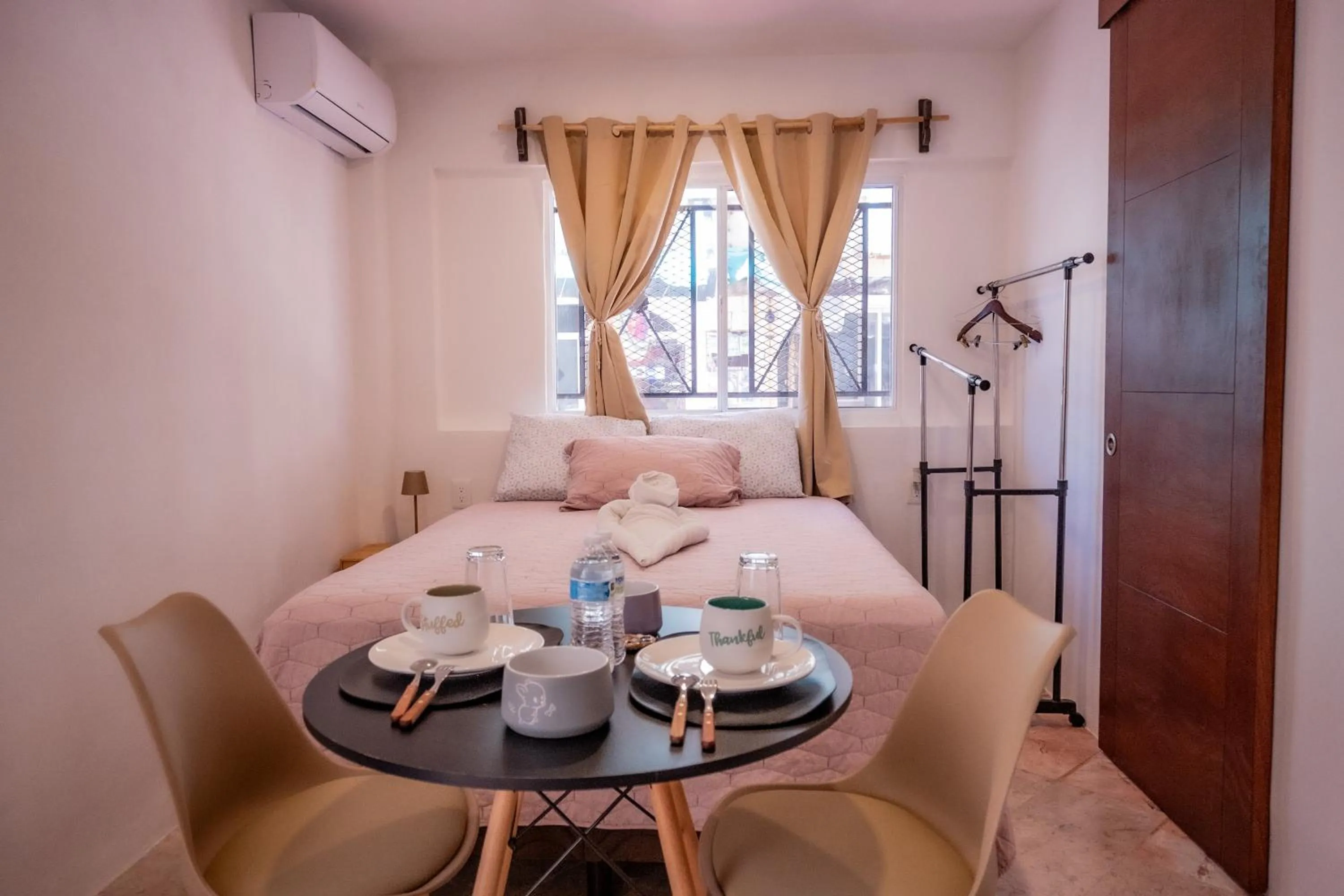 Bed in Cancún Suites Apartments - Hotel Zone