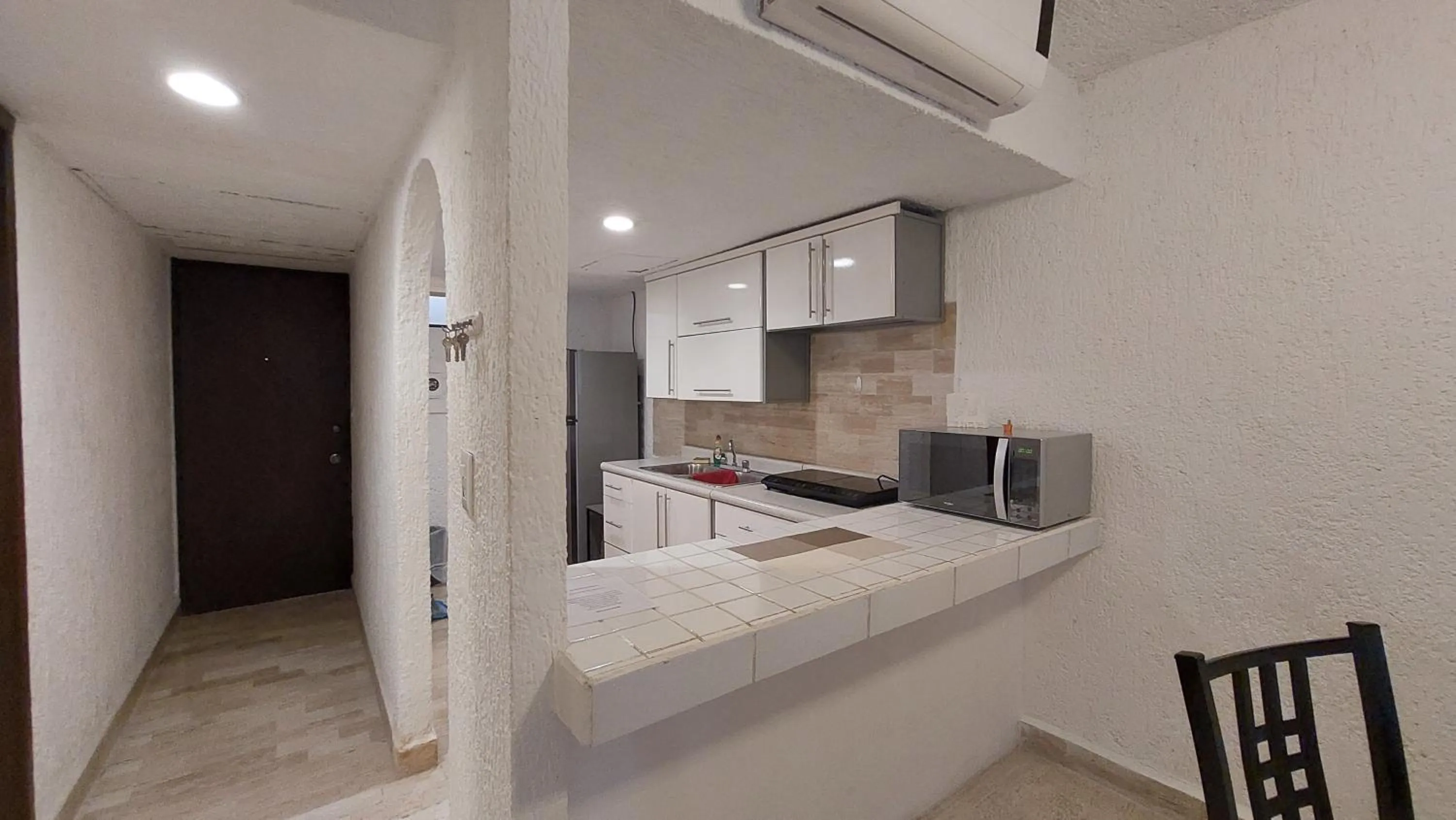 Kitchen or kitchenette in Cancún Suites Apartments - Hotel Zone
