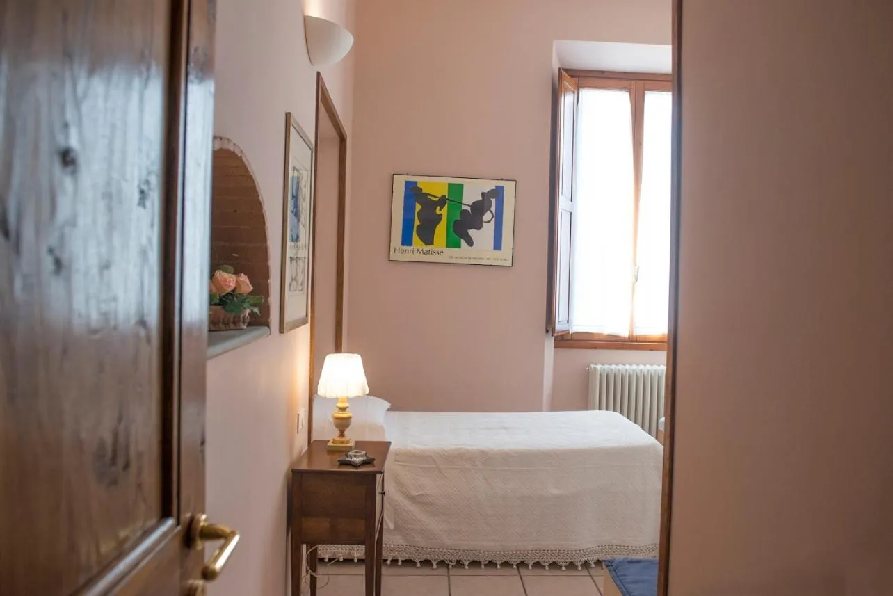 Bed in Affittacamere Benedetta