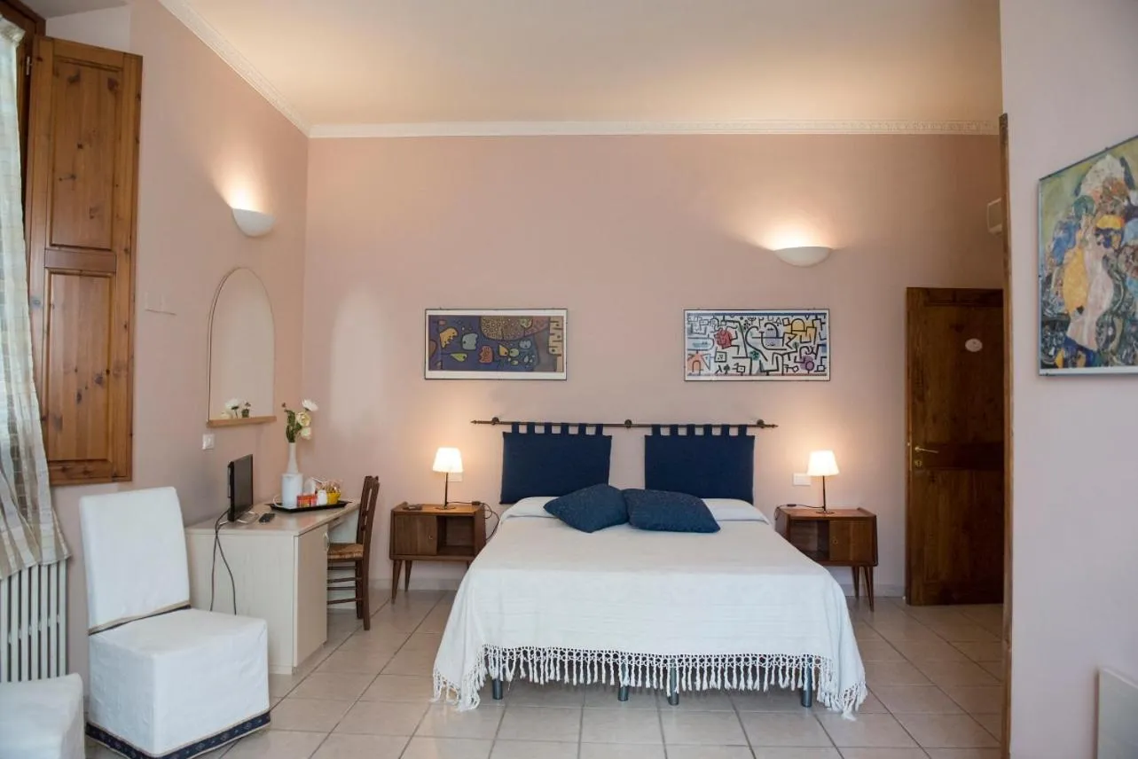 Bed in Affittacamere Benedetta