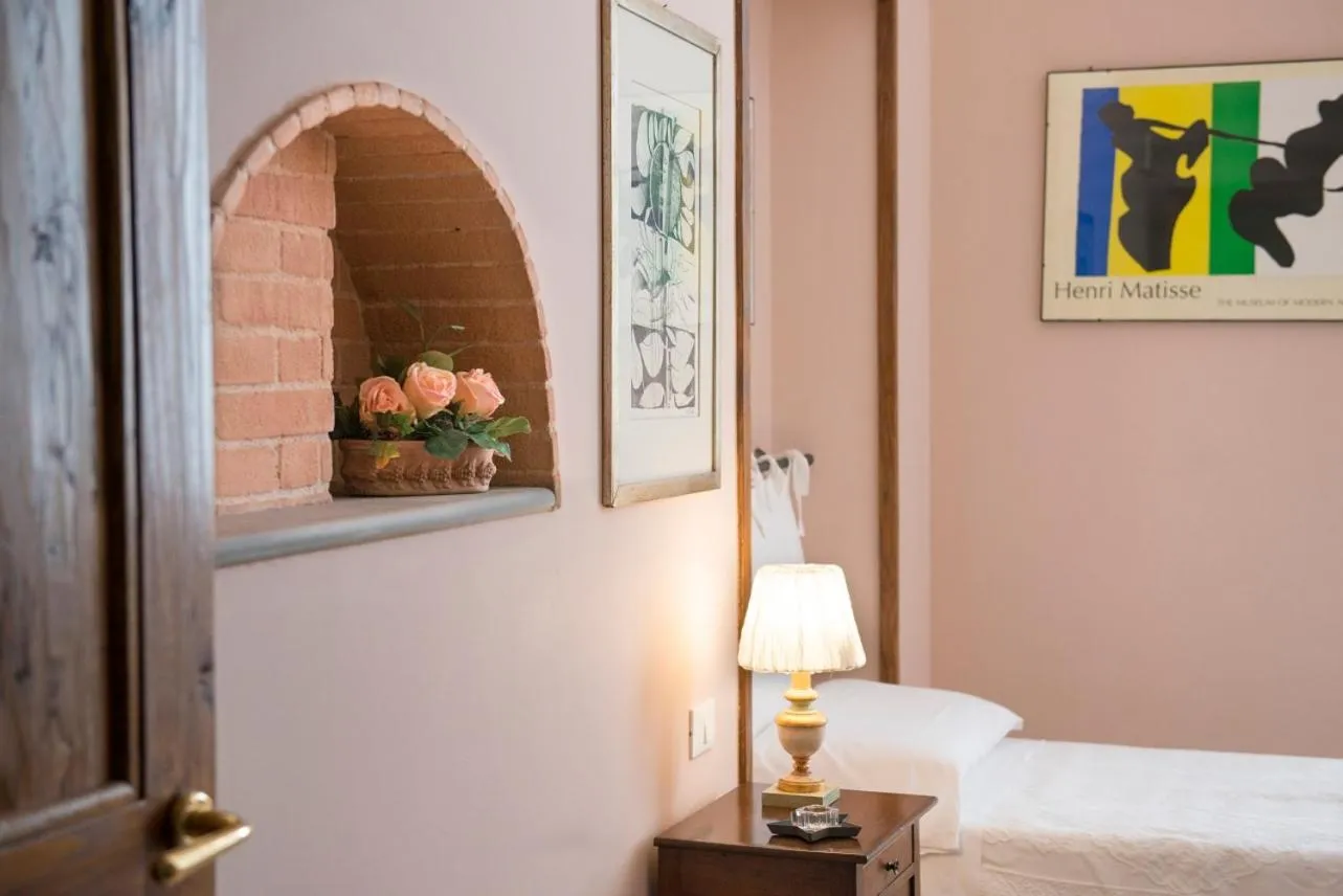 Bed in Affittacamere Benedetta