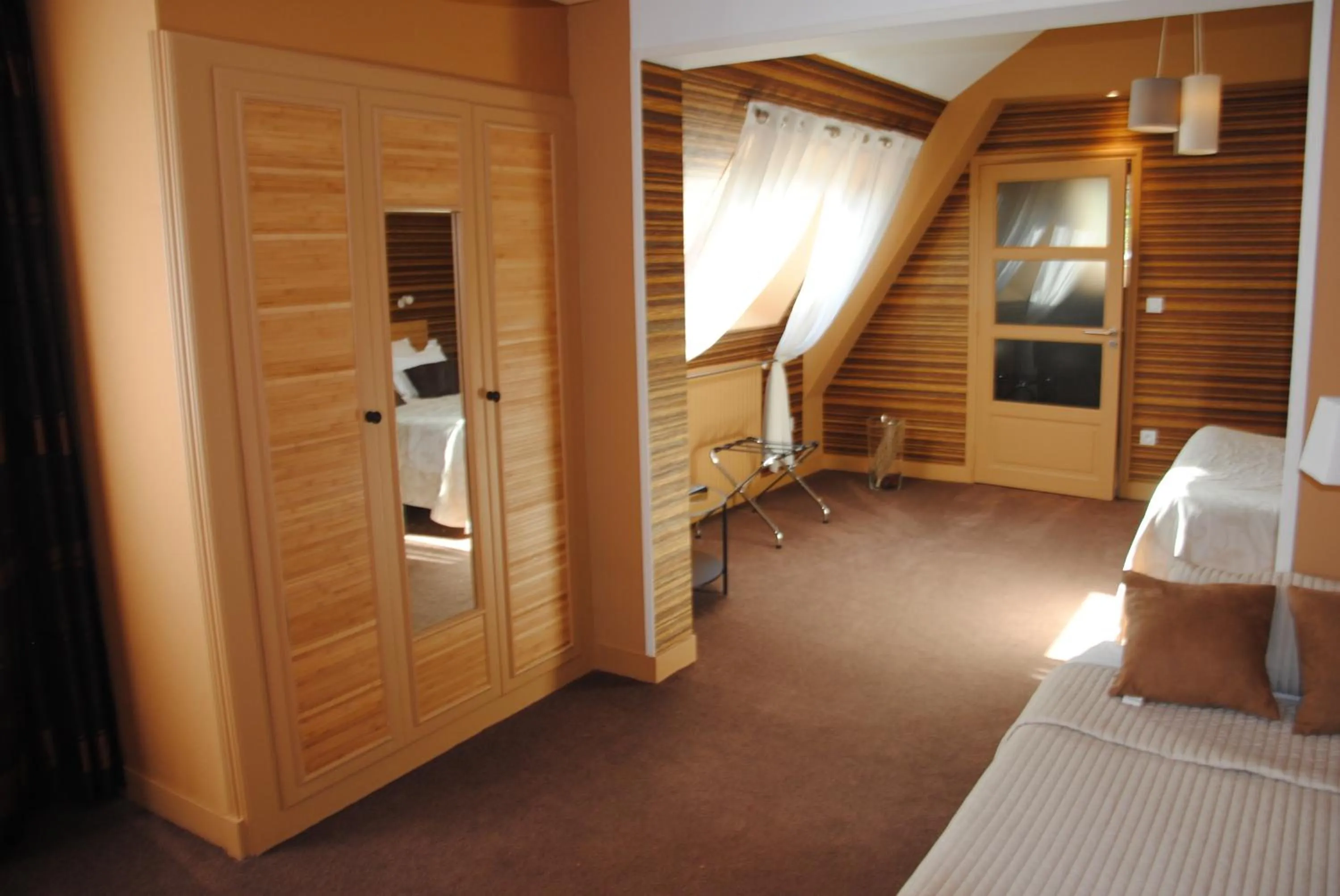 Photo of the whole room, Bed in Logis Hotel Du Casino Restaurant Le Mathelia