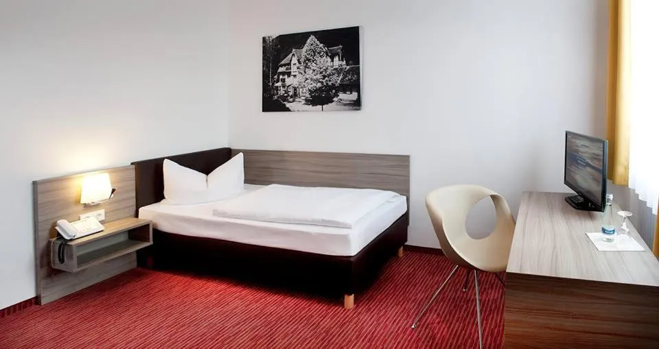 Bed in Hotel Grüner Baum