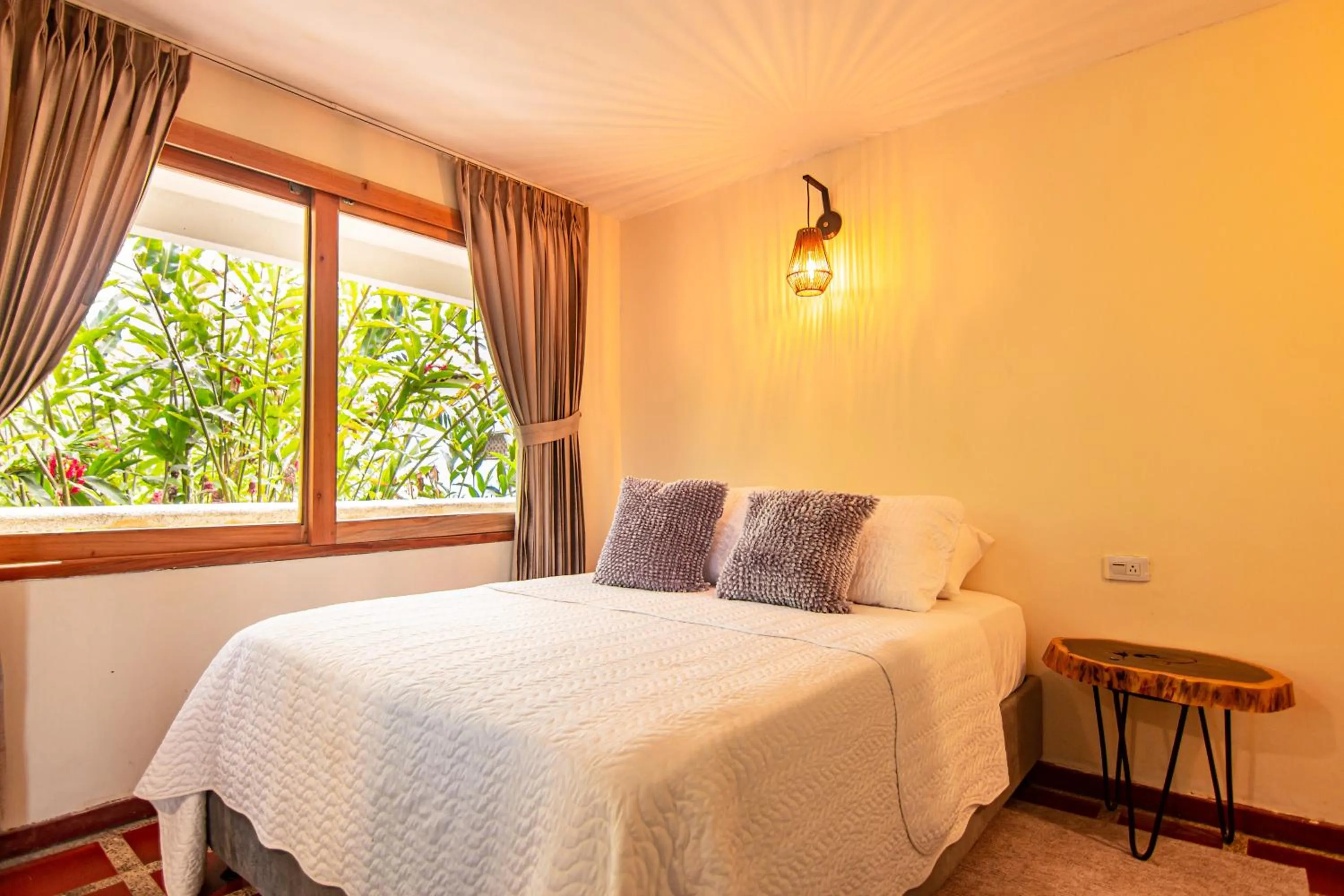 Bed in Portales del Tayrona Garden Hotel